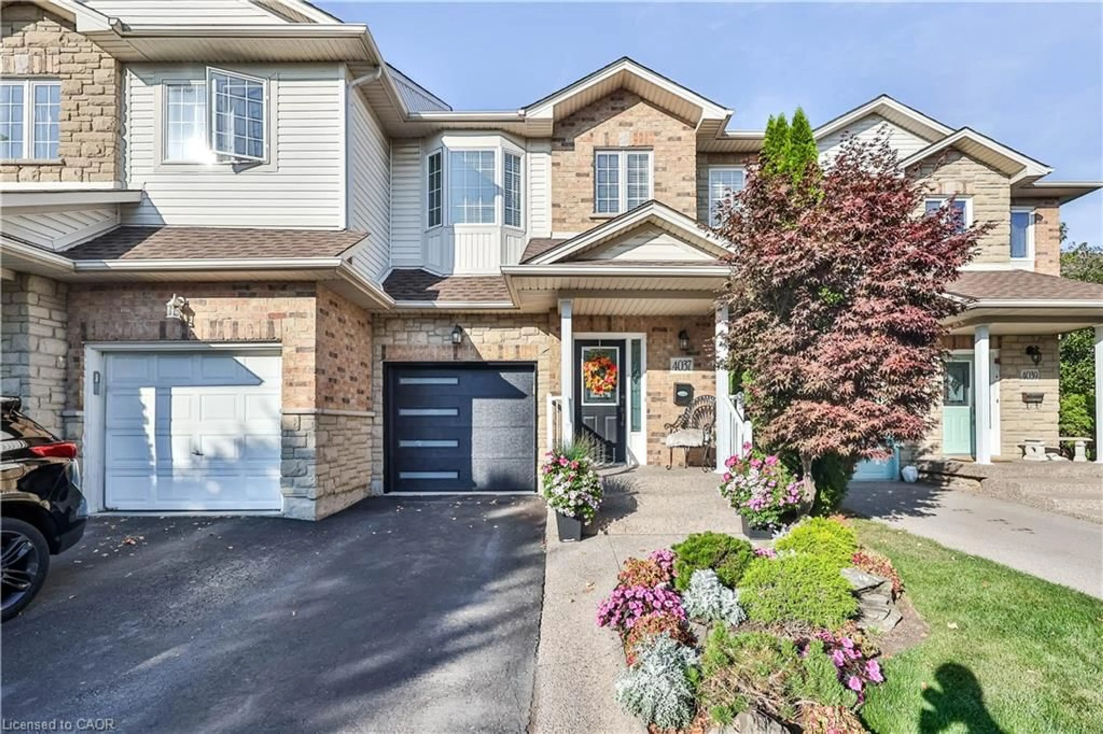 Home with brick exterior material, street for 4037 Medland Dr, Burlington Ontario L7M 4W7
