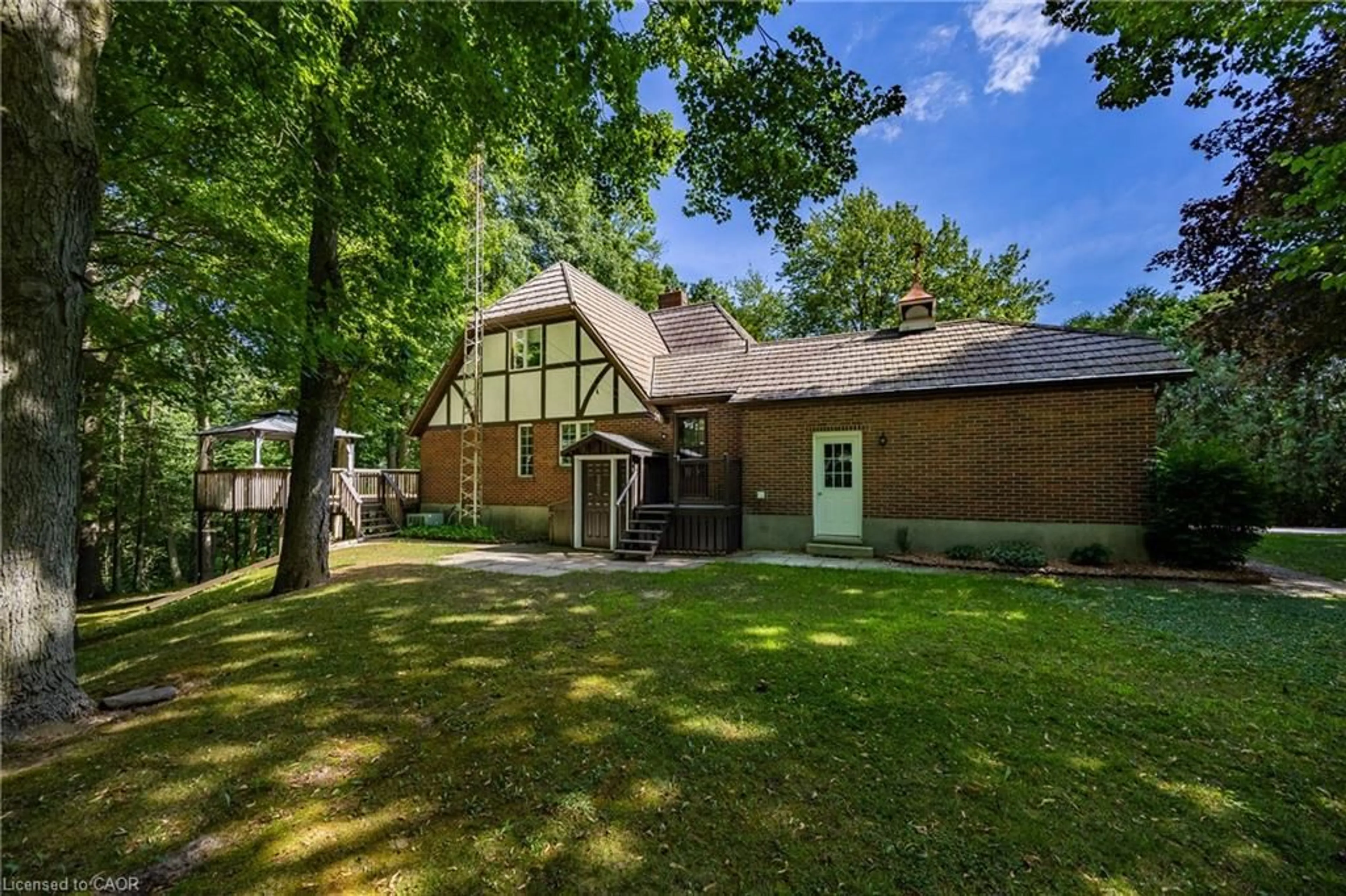 A pic from outside/outdoor area/front of a property/back of a property/a pic from drone, unknown for 21 Mcdowell Rd, Langton Ontario N0E 1G0