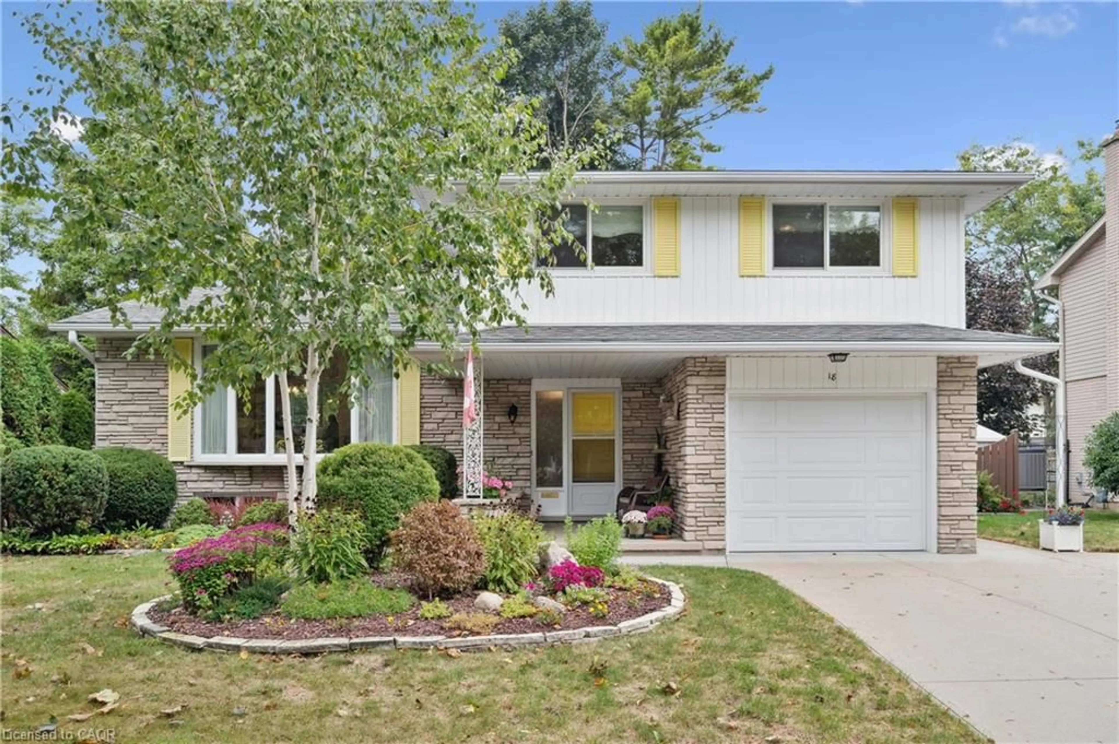 Home with vinyl exterior material, street for 18 Simpson Ave, Kitchener Ontario N2A 1L3