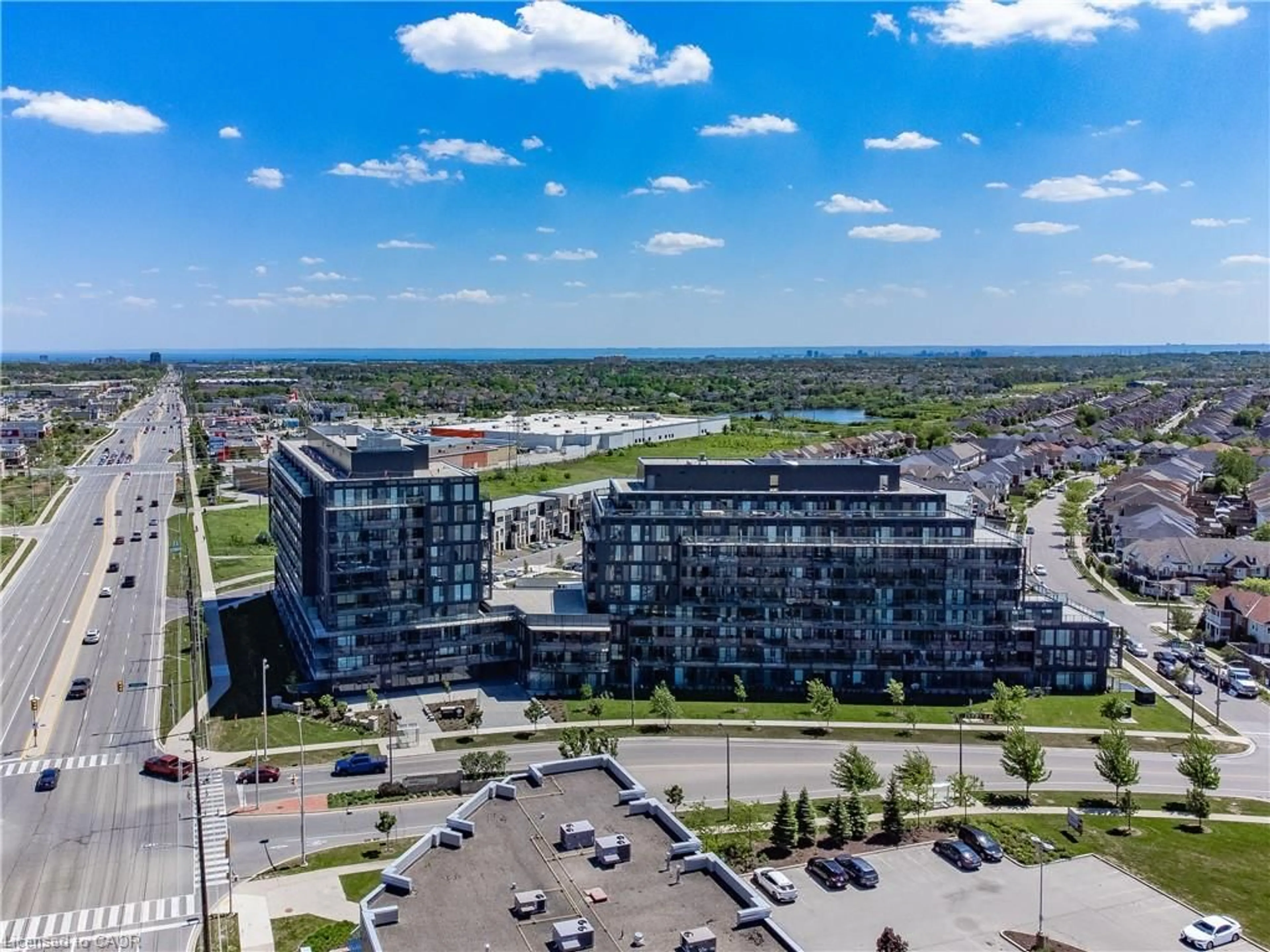 A pic from outside/outdoor area/front of a property/back of a property/a pic from drone, city buildings view from balcony for 3200 Dakota Common #B602, Burlington Ontario L7M 2A7