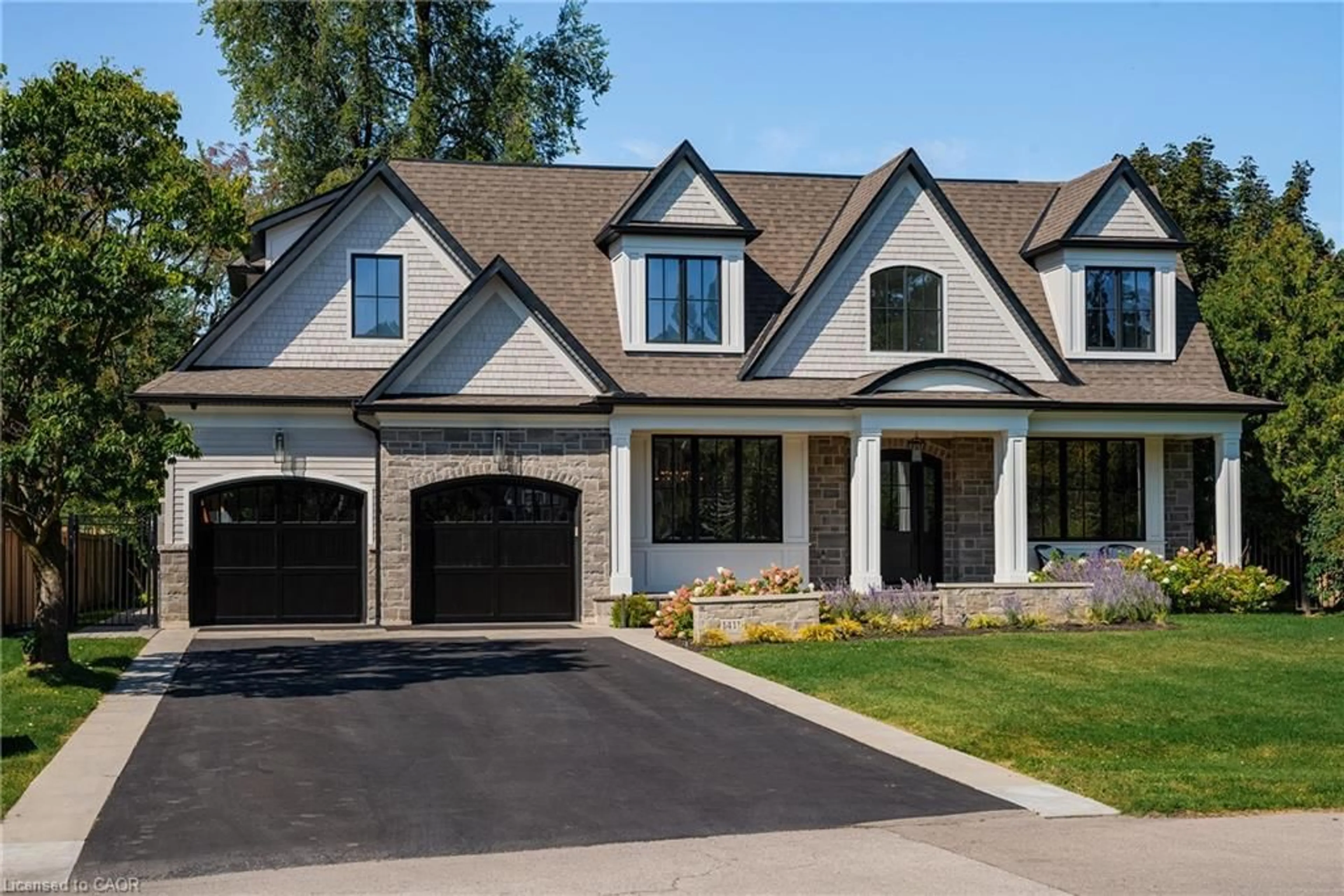 Home with brick exterior material, street for 1411 Willowdown Rd, Oakville Ontario L6L 1X2