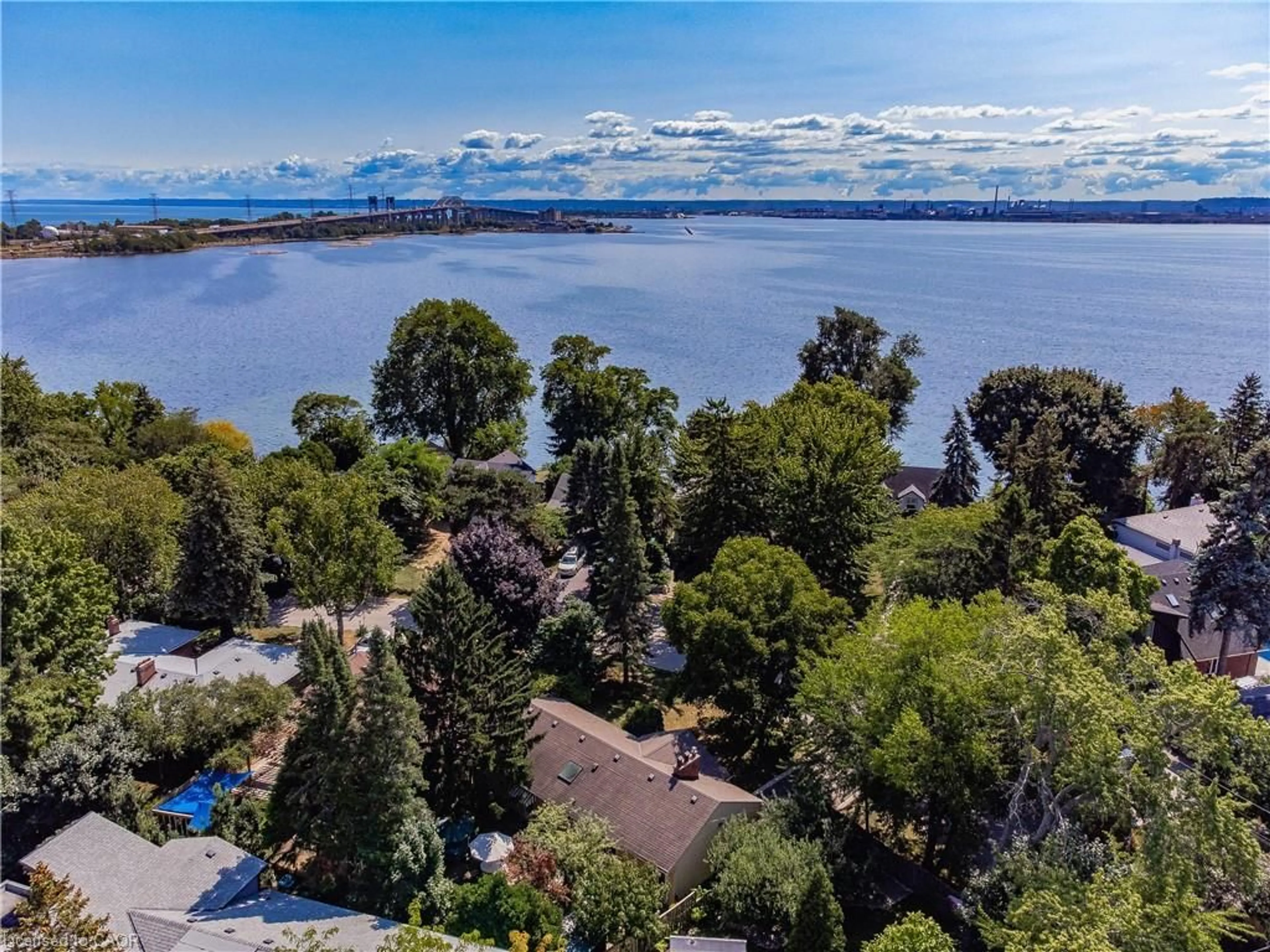 A pic from outside/outdoor area/front of a property/back of a property/a pic from drone, water/lake/river/ocean view for 557 Stillwater Cres, Burlington Ontario L7T 3M8