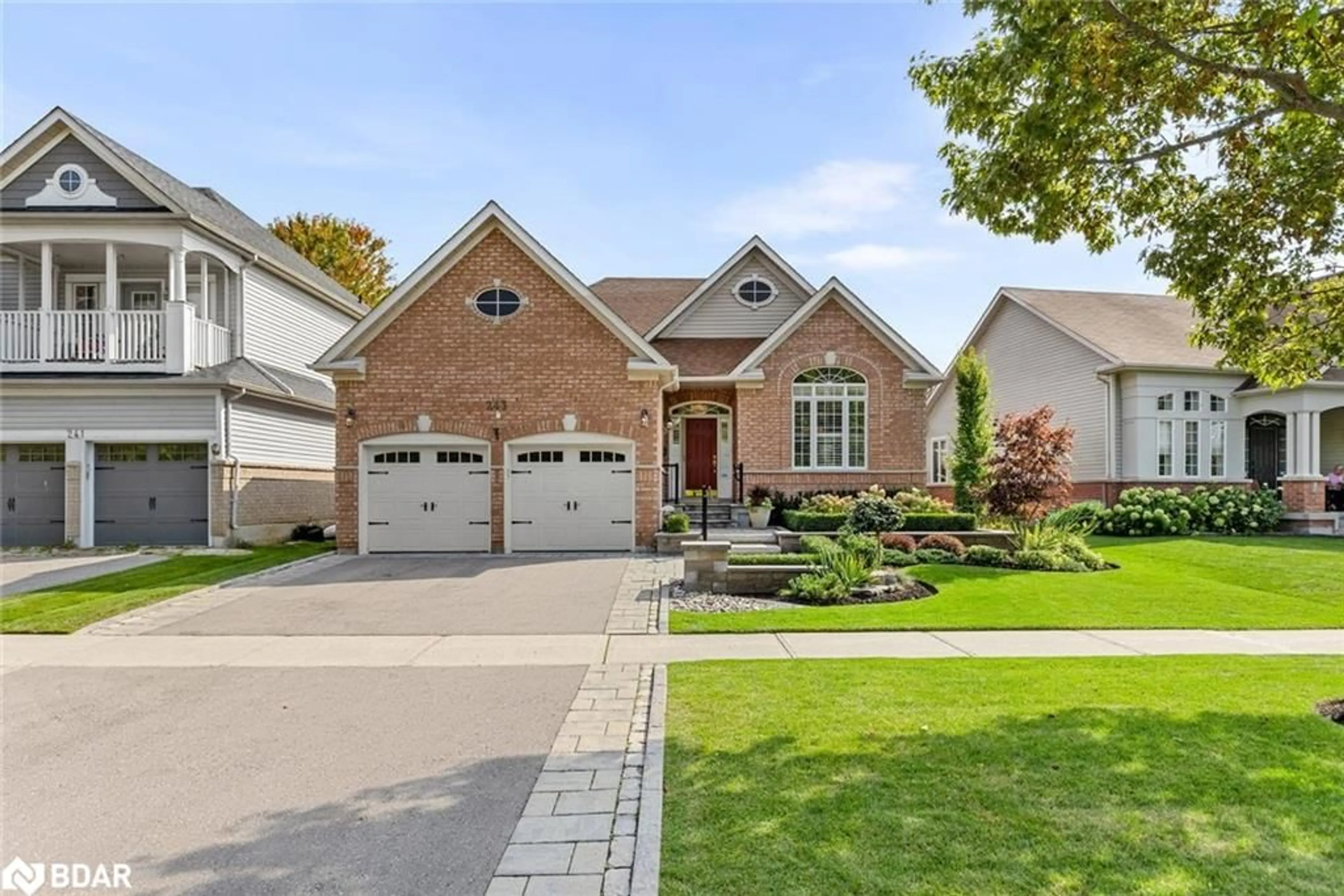 Home with brick exterior material, street for 243 Whitby Shores Greenway, Whitby Ontario L1N 9N9