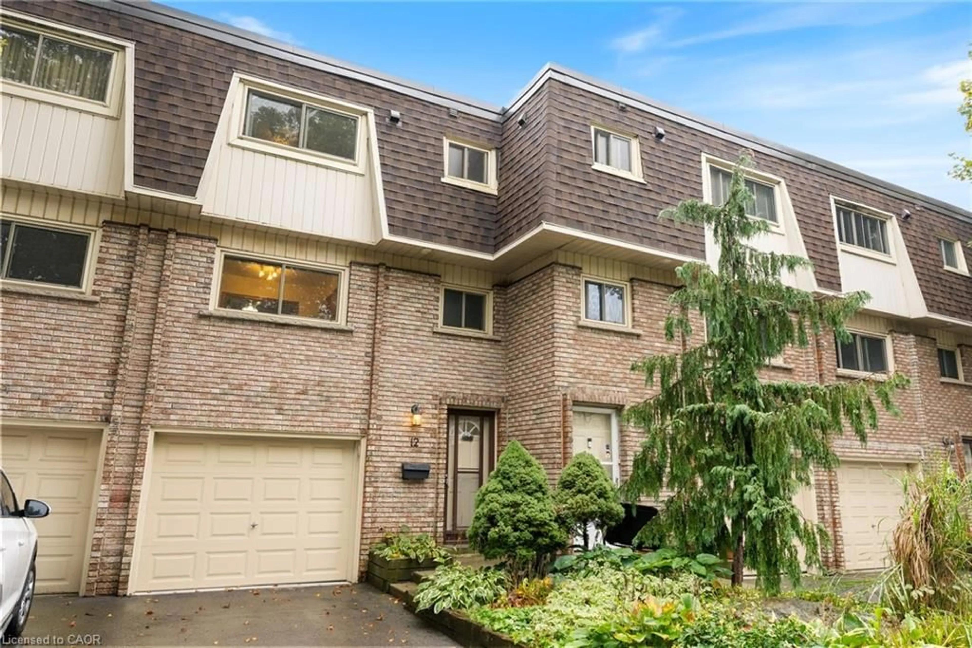 Home with brick exterior material, street for 125 Bonaventure Dr #12, Hamilton Ontario L9C 5Y9