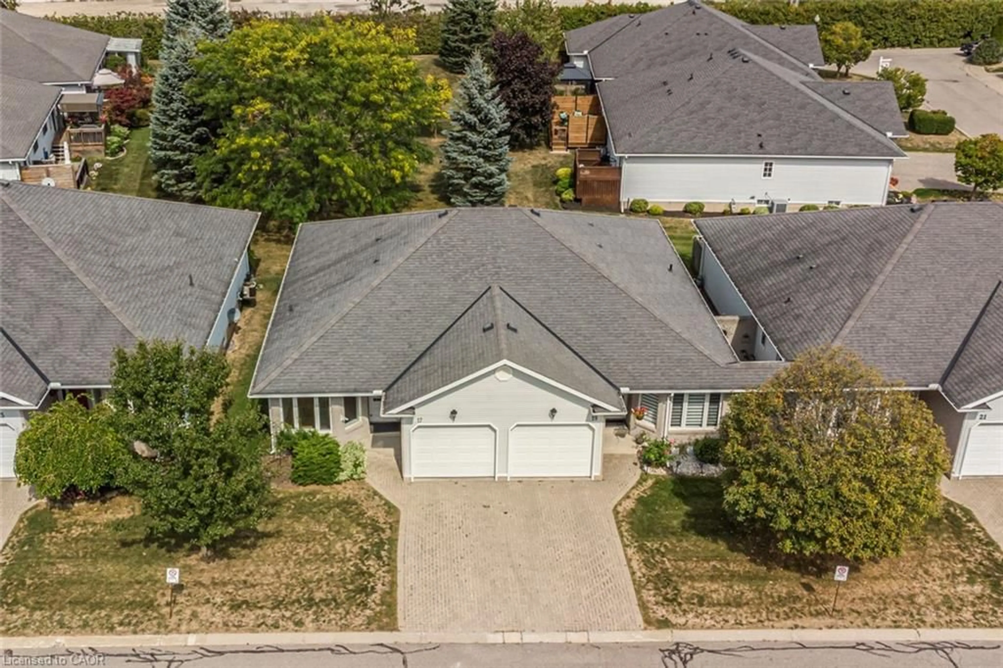 A pic from outside/outdoor area/front of a property/back of a property/a pic from drone, street for 17 Garden Dr #21, Smithville Ontario L0R 2A0