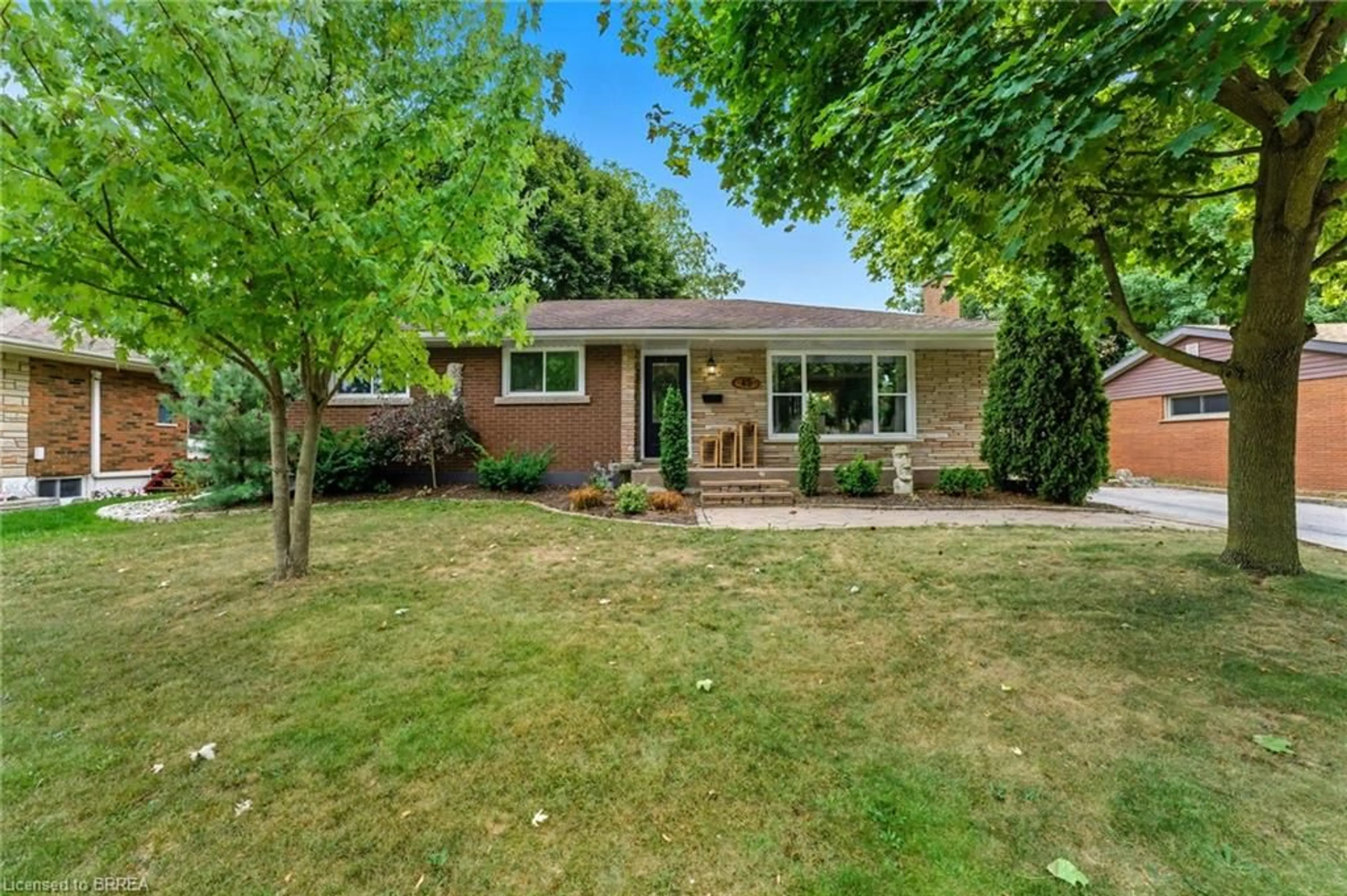 Home with brick exterior material, street for 45 Driftwood Dr, Brantford Ontario N3R 3K2