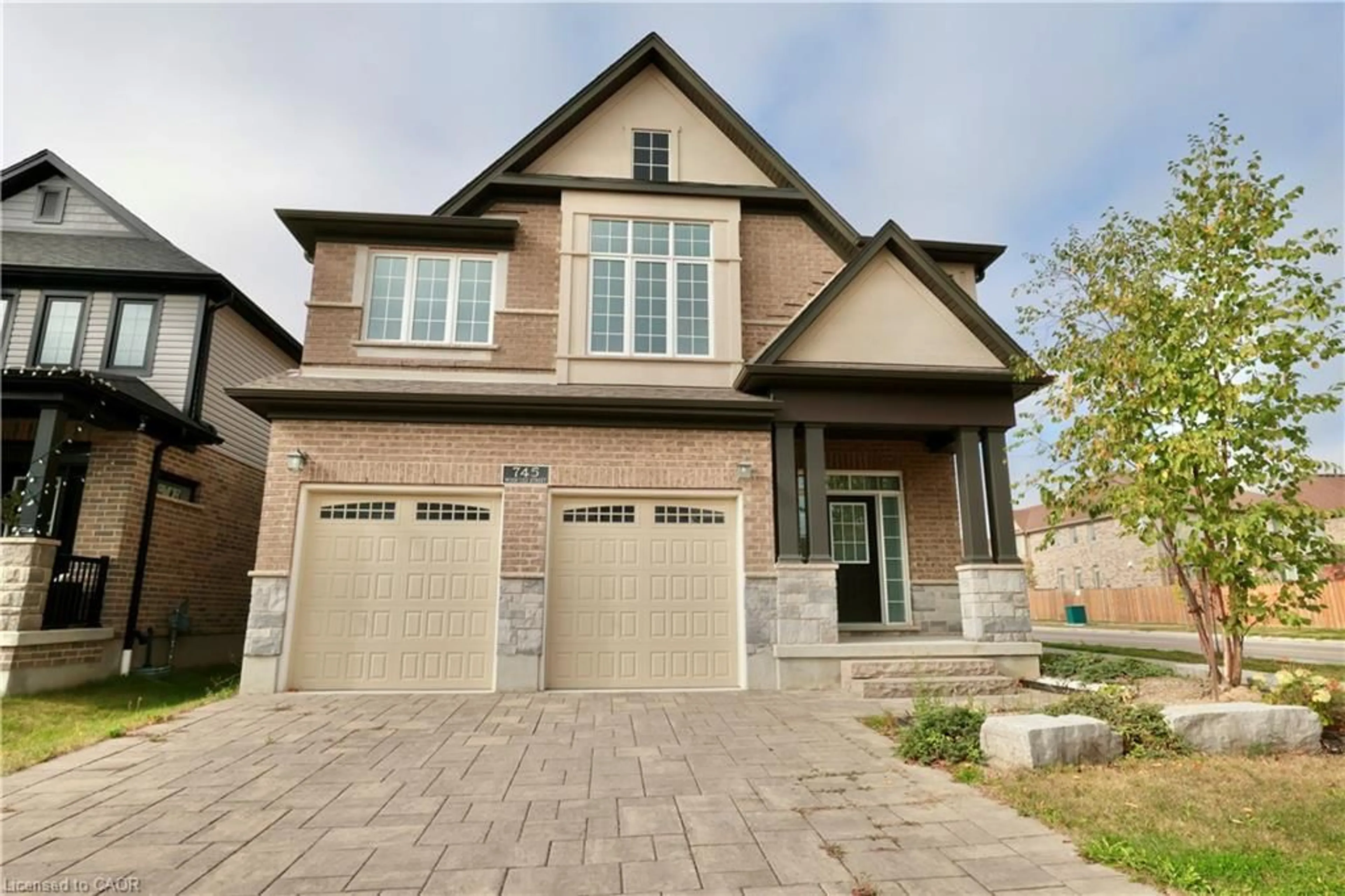 Home with brick exterior material, street for 745 Wood Lily St, Waterloo Ontario N2V 0C3