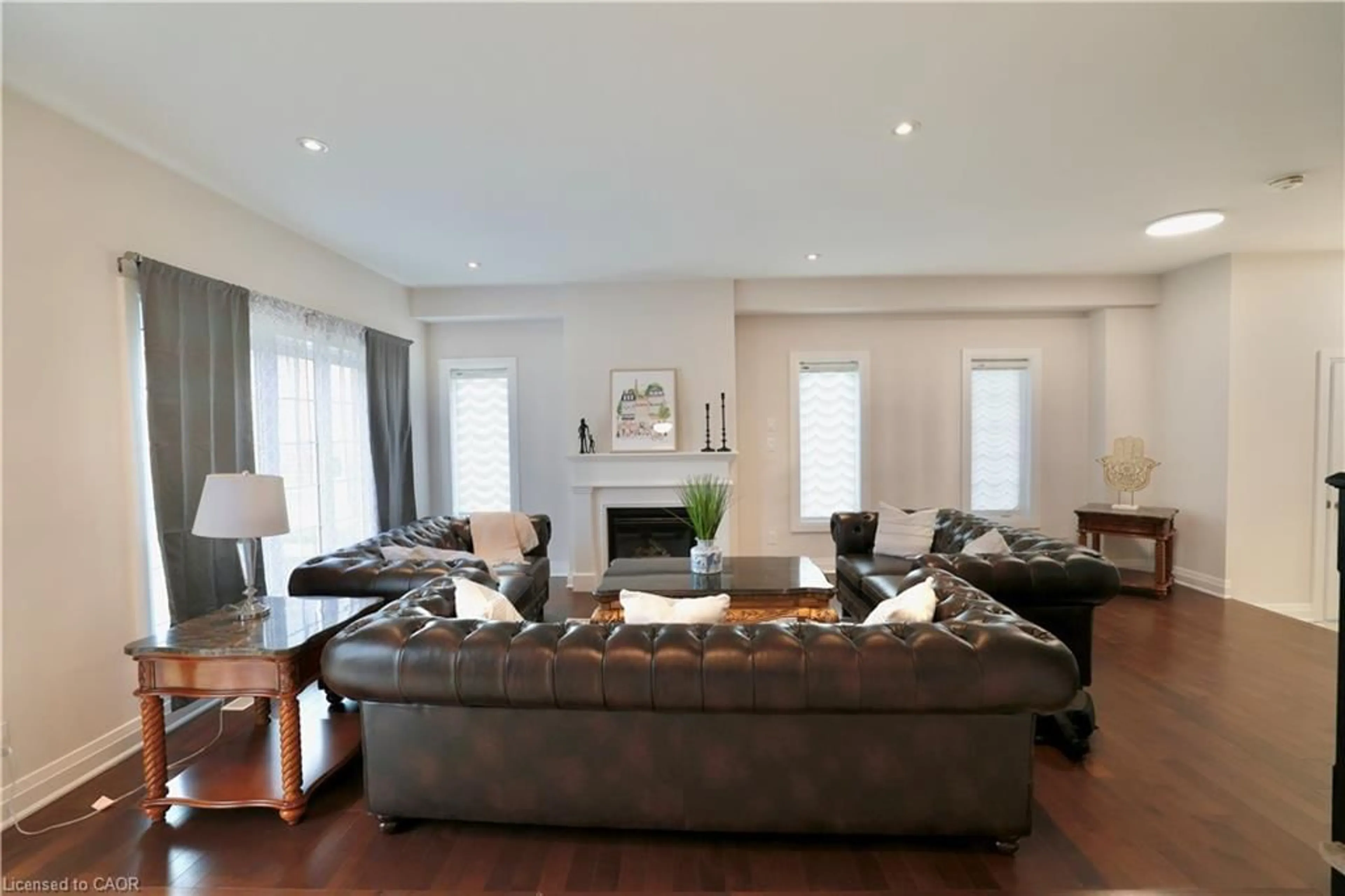 Living room with furniture, wood/laminate floor for 745 Wood Lily St, Waterloo Ontario N2V 0C3