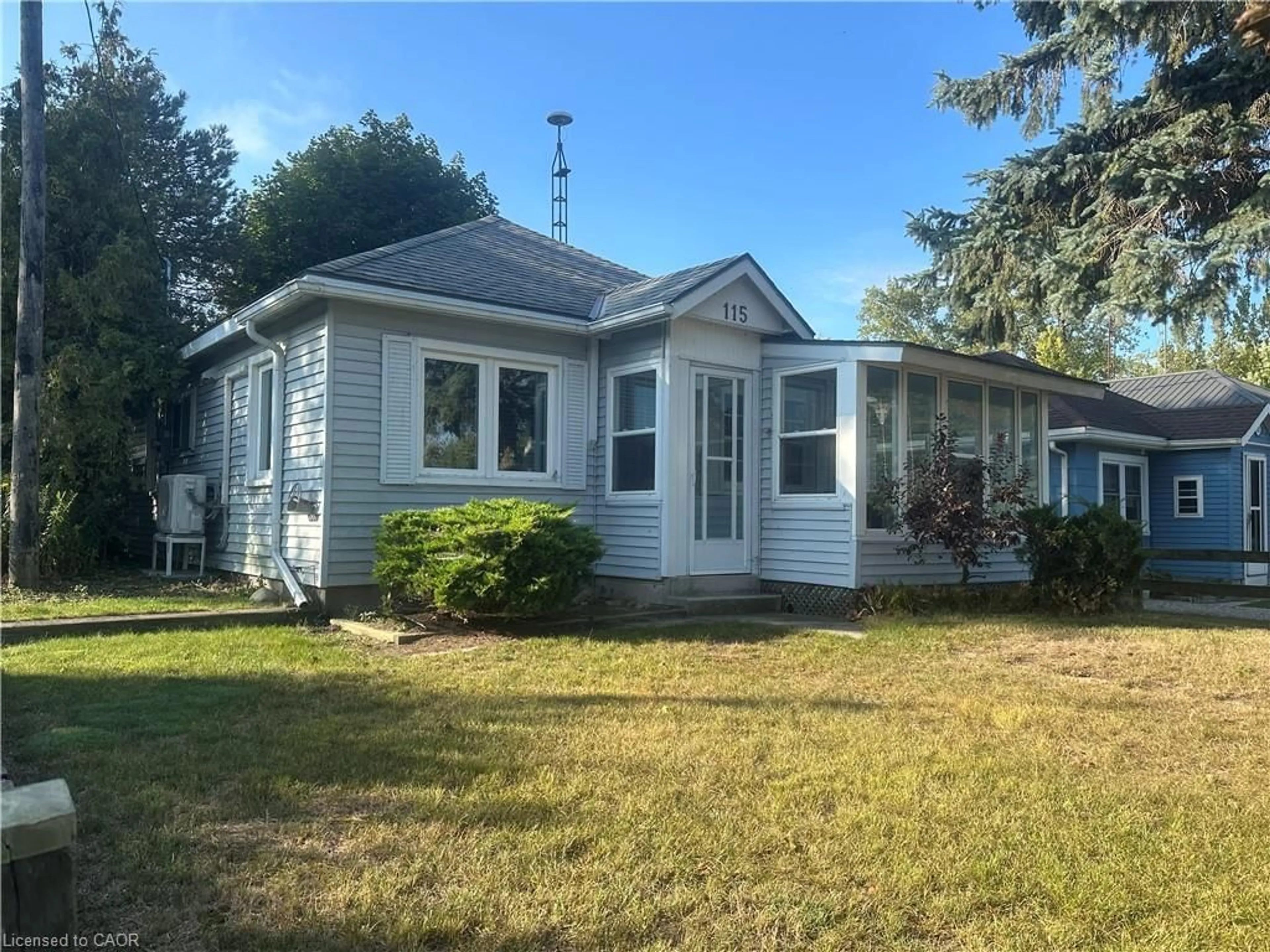 Home with vinyl exterior material, street for 115 Erie Blvd, Long Point Ontario N0E 1M0