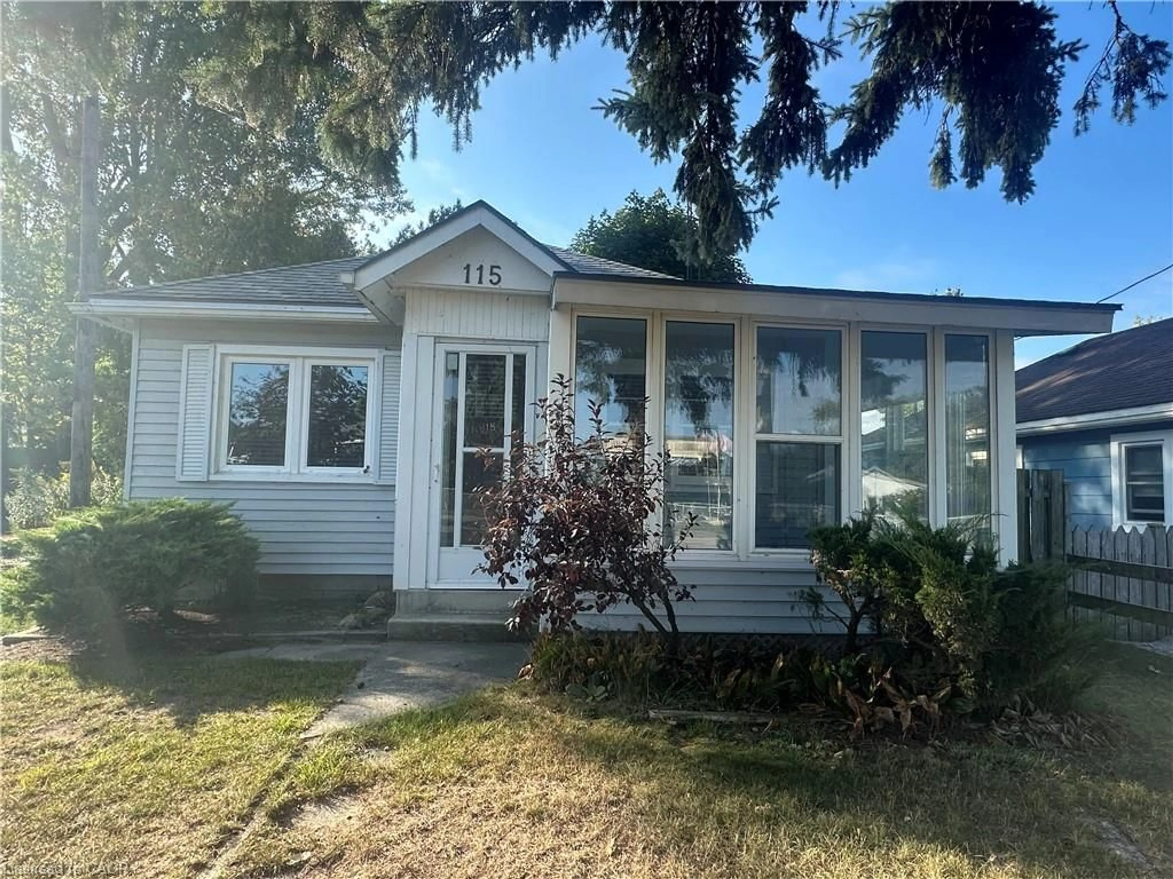 Home with vinyl exterior material, street for 115 Erie Blvd, Long Point Ontario N0E 1M0