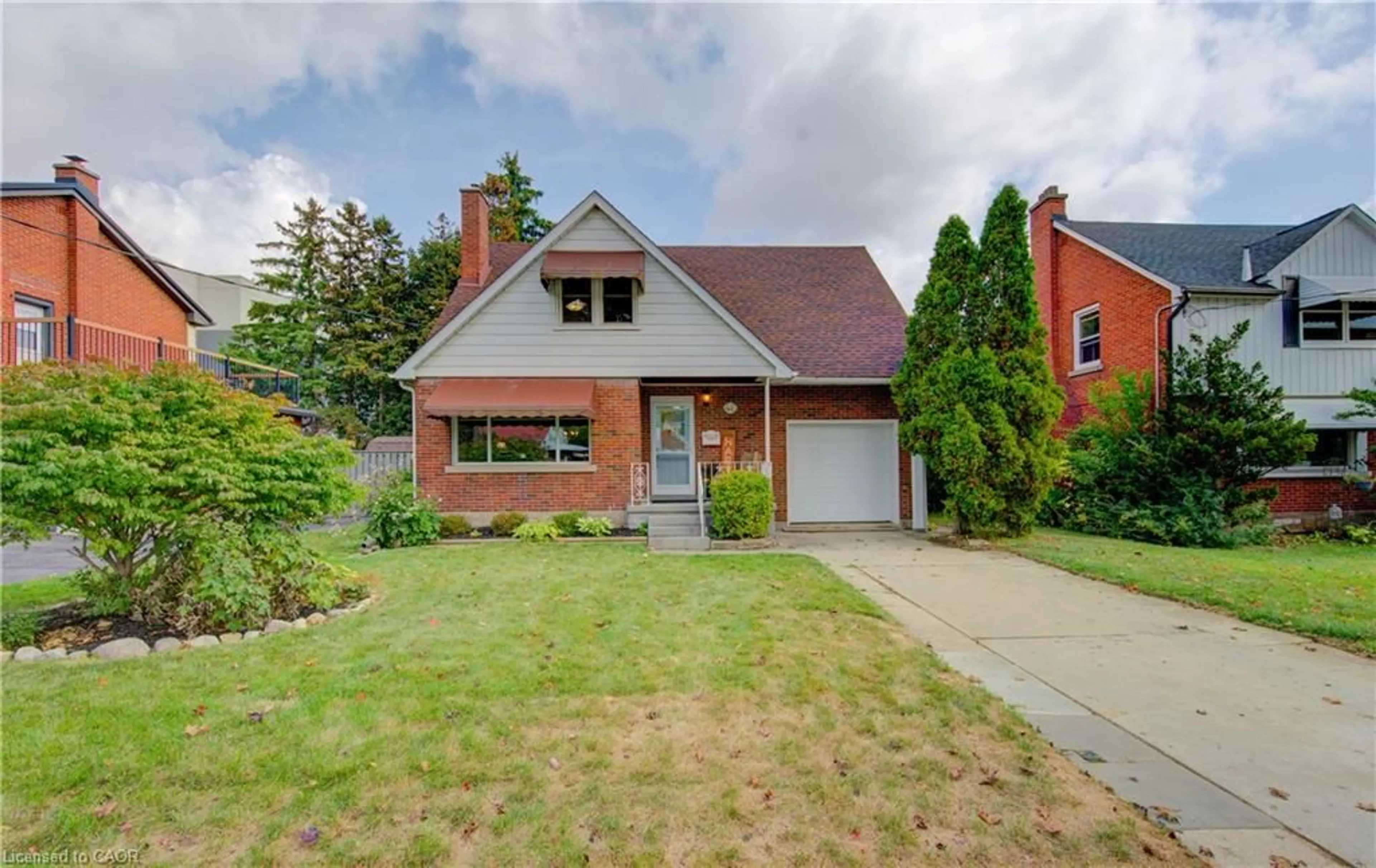 Home with brick exterior material, street for 48 East Ave, Kitchener Ontario N2H 1Y7