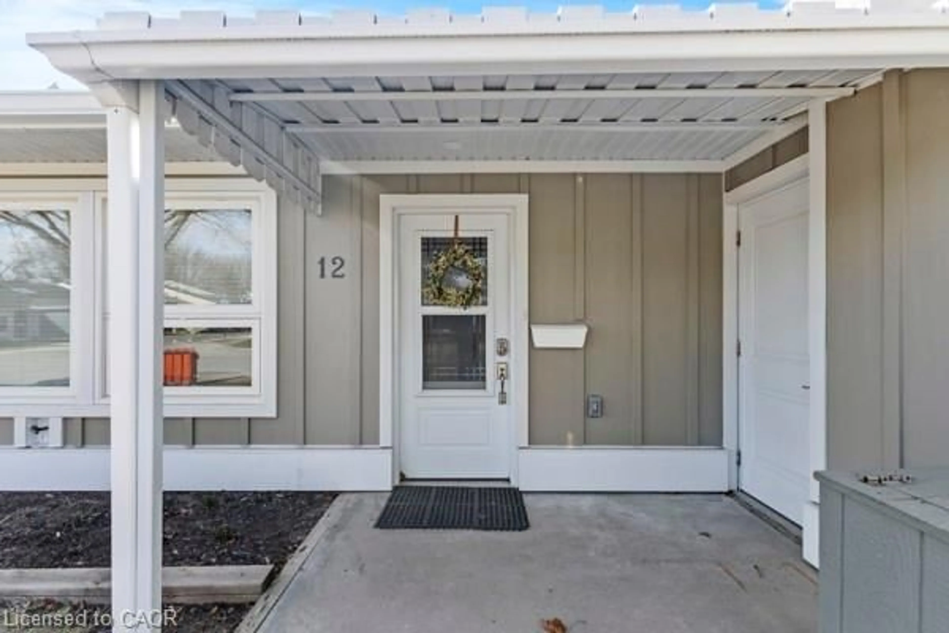 Home with vinyl exterior material, street for 12 Nolan Trail, Hamilton Ontario L8B 1T8