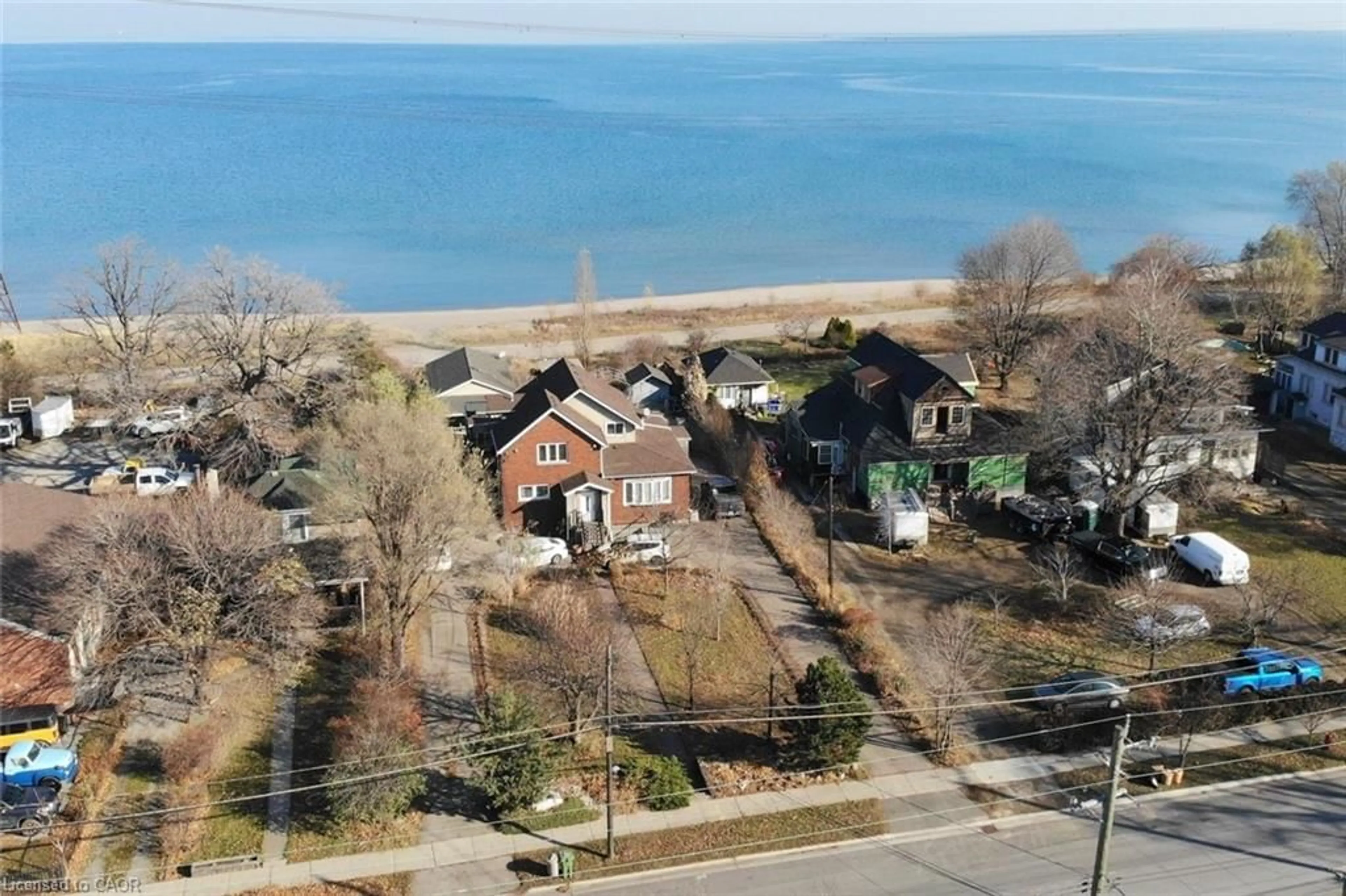 A pic from outside/outdoor area/front of a property/back of a property/a pic from drone, water/lake/river/ocean view for 645 Beach Blvd, Hamilton Ontario L8H 6X8