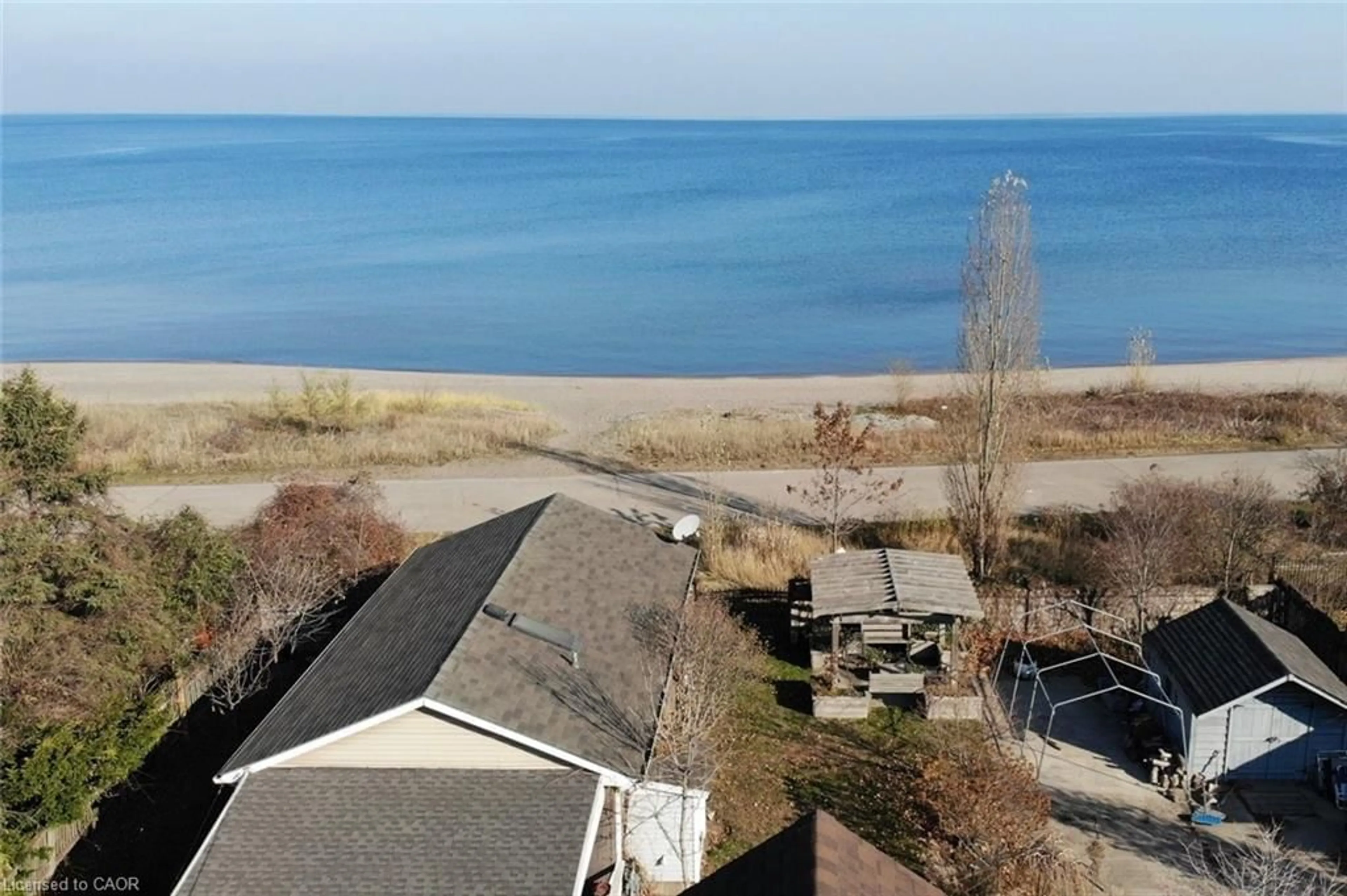 A pic from outside/outdoor area/front of a property/back of a property/a pic from drone, water/lake/river/ocean view for 645 Beach Blvd, Hamilton Ontario L8H 6X8