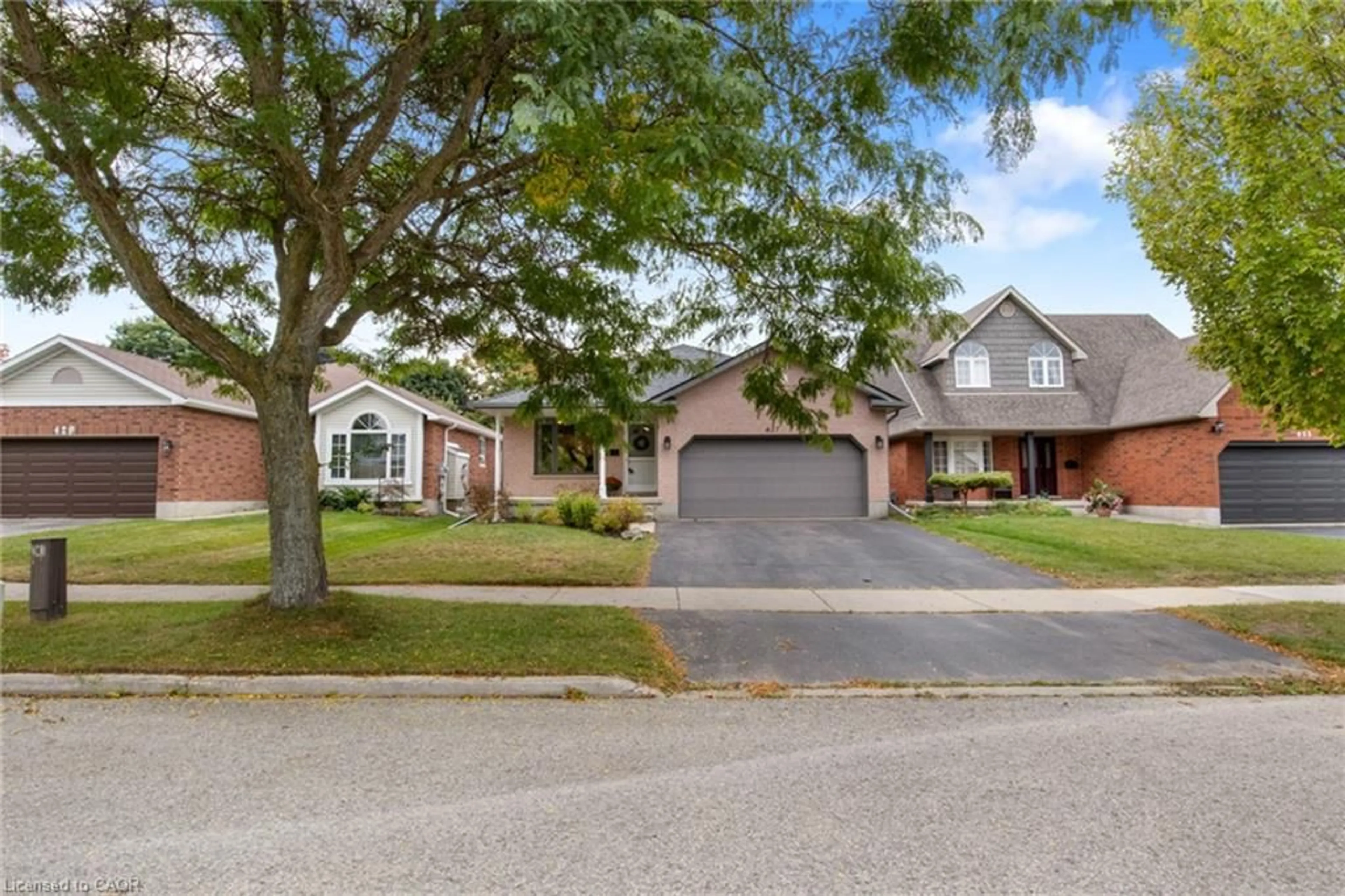 Home with brick exterior material, street for 427 Dansbury Dr, Waterloo Ontario N2K 3X9