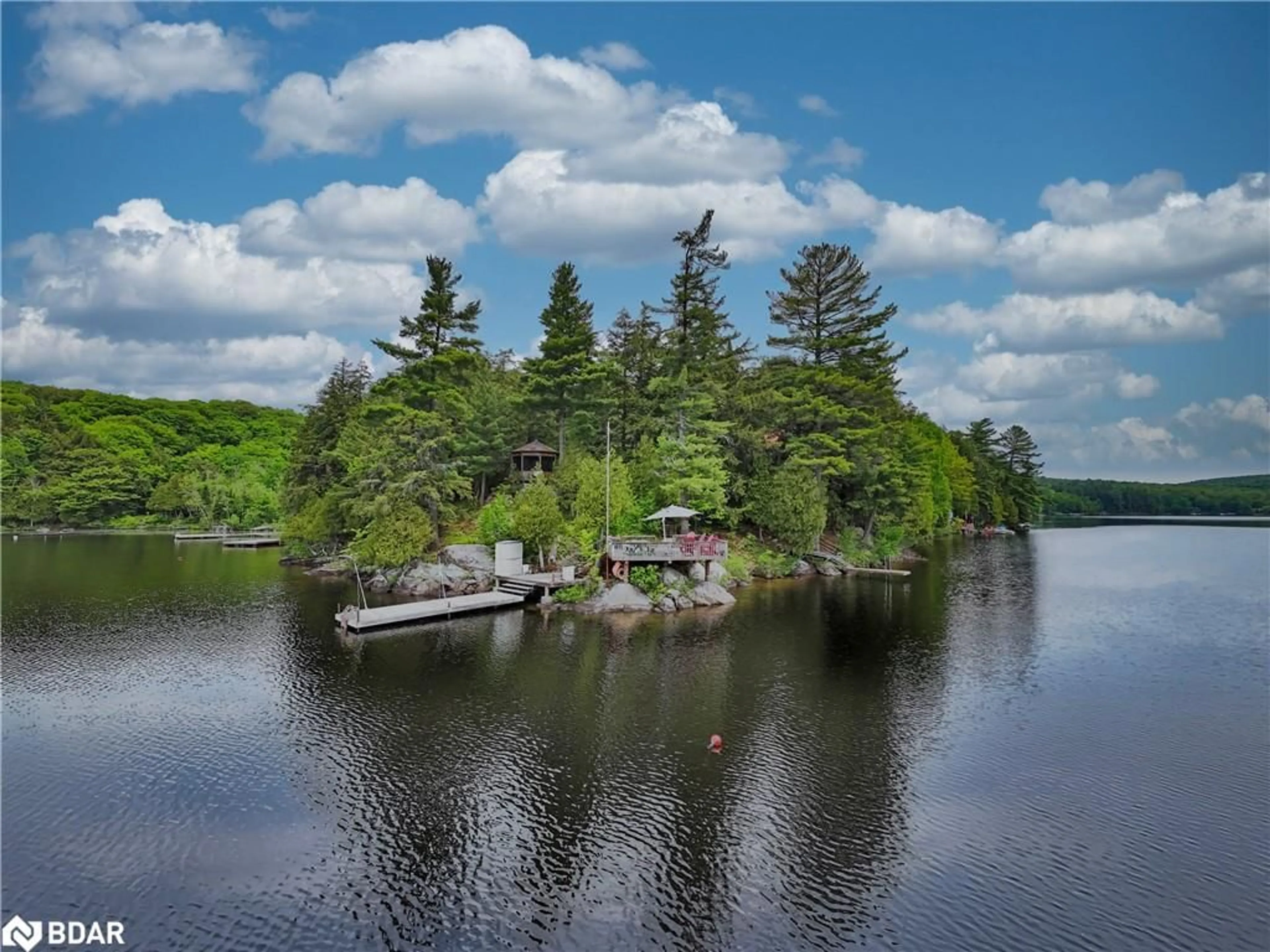 A pic from outside/outdoor area/front of a property/back of a property/a pic from drone, water/lake/river/ocean view for 230 Doe Lake Peninsula, Katrine Ontario P0A 1L0