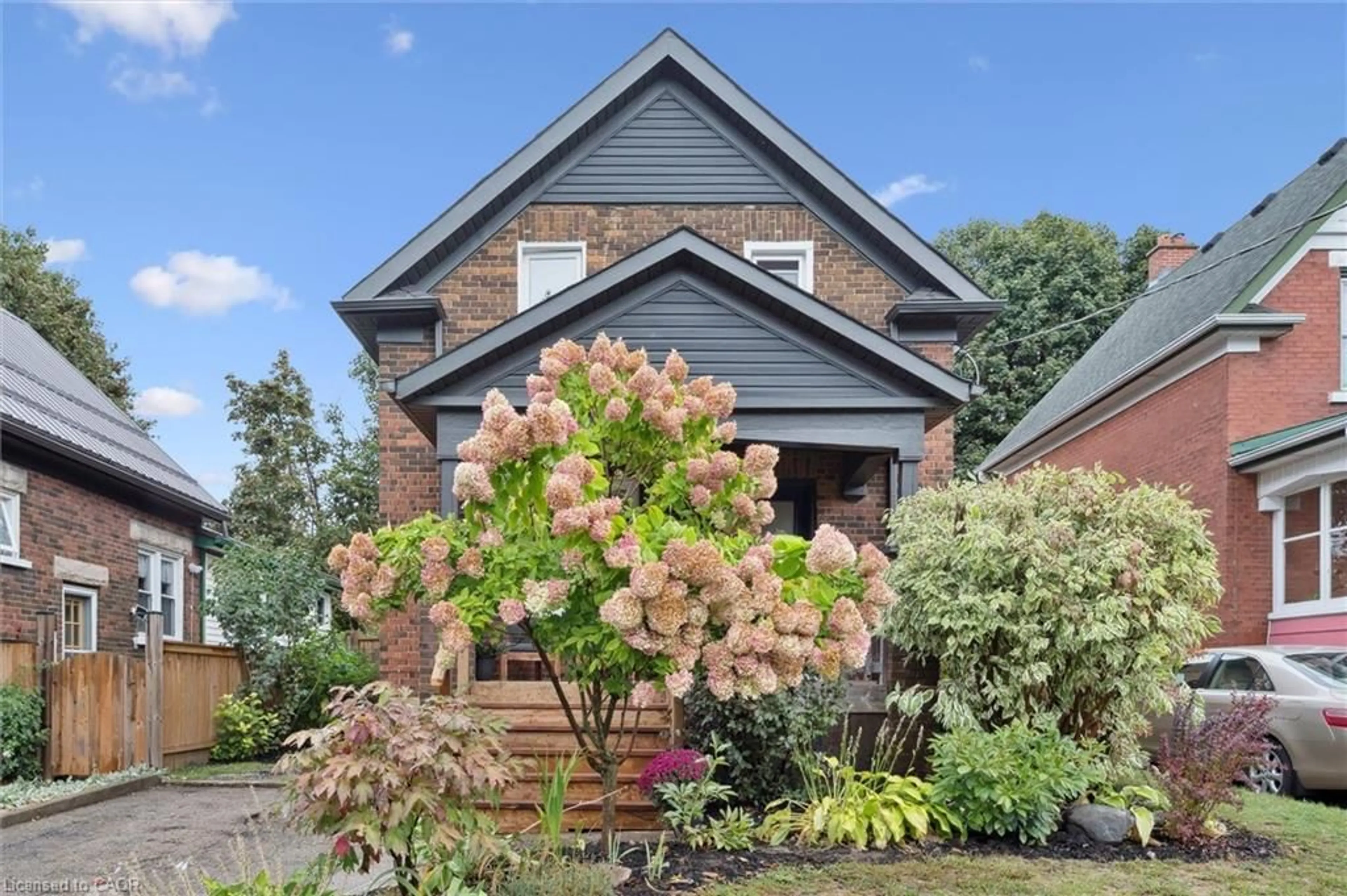 Home with brick exterior material, street for 100 Dekay St, Kitchener Ontario N2H 3T6