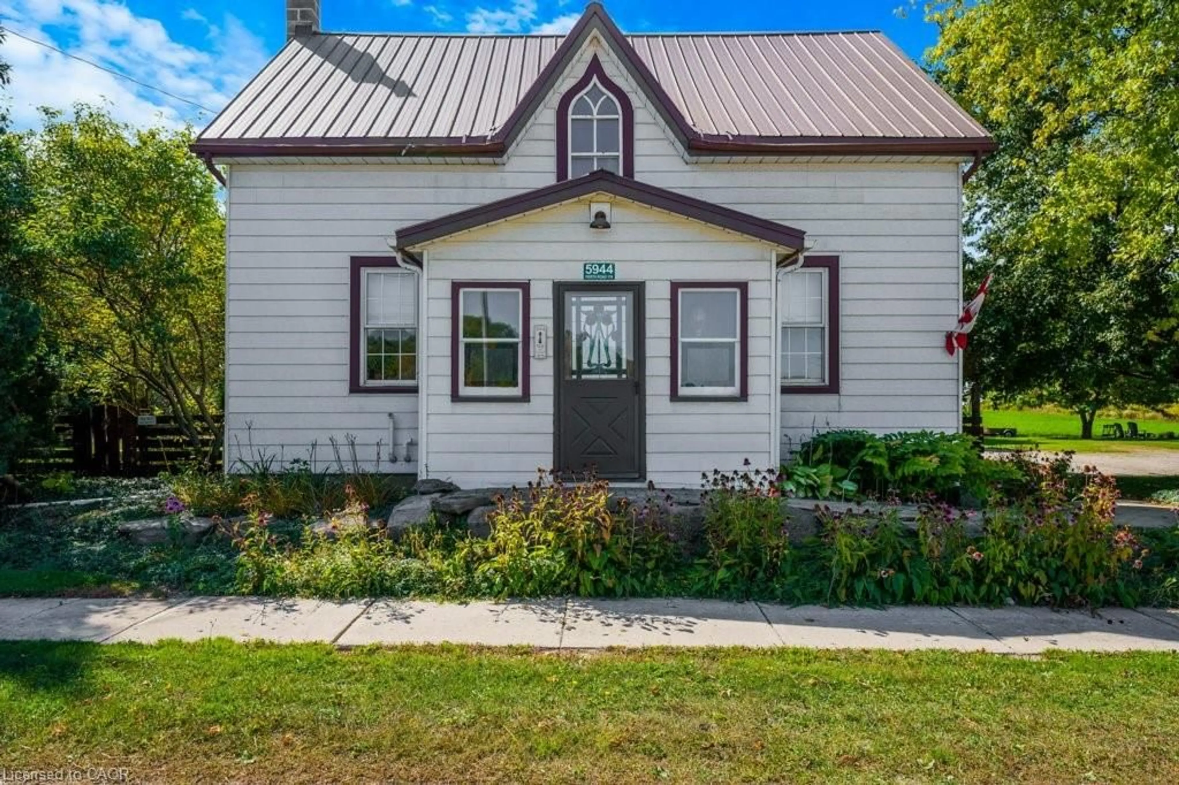 Home with vinyl exterior material, street for 5944 Perth Road 119, Brunner Ontario N0K 1C0