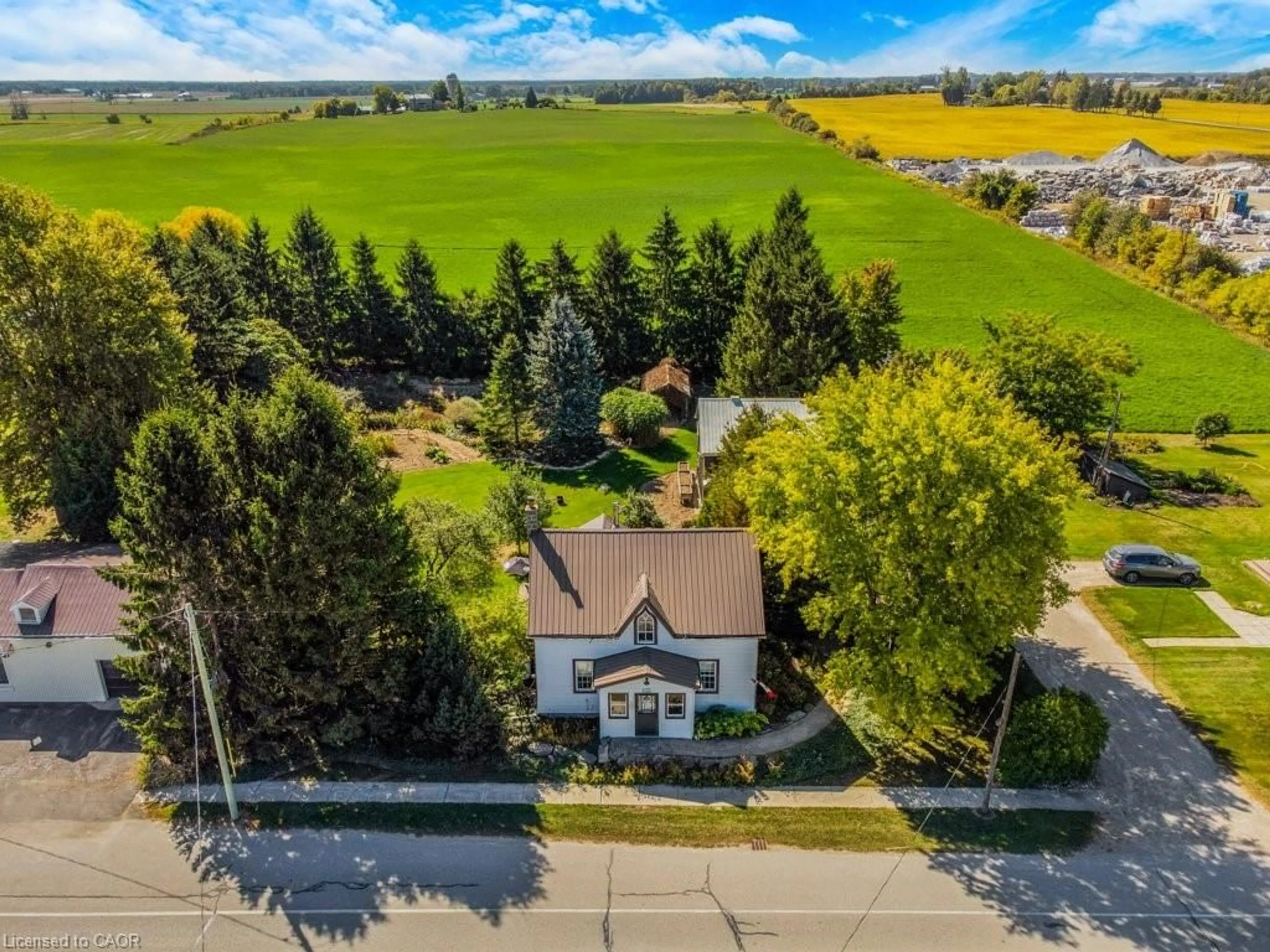 A pic from outside/outdoor area/front of a property/back of a property/a pic from drone, street for 5944 Perth Road 119, Brunner Ontario N0K 1C0