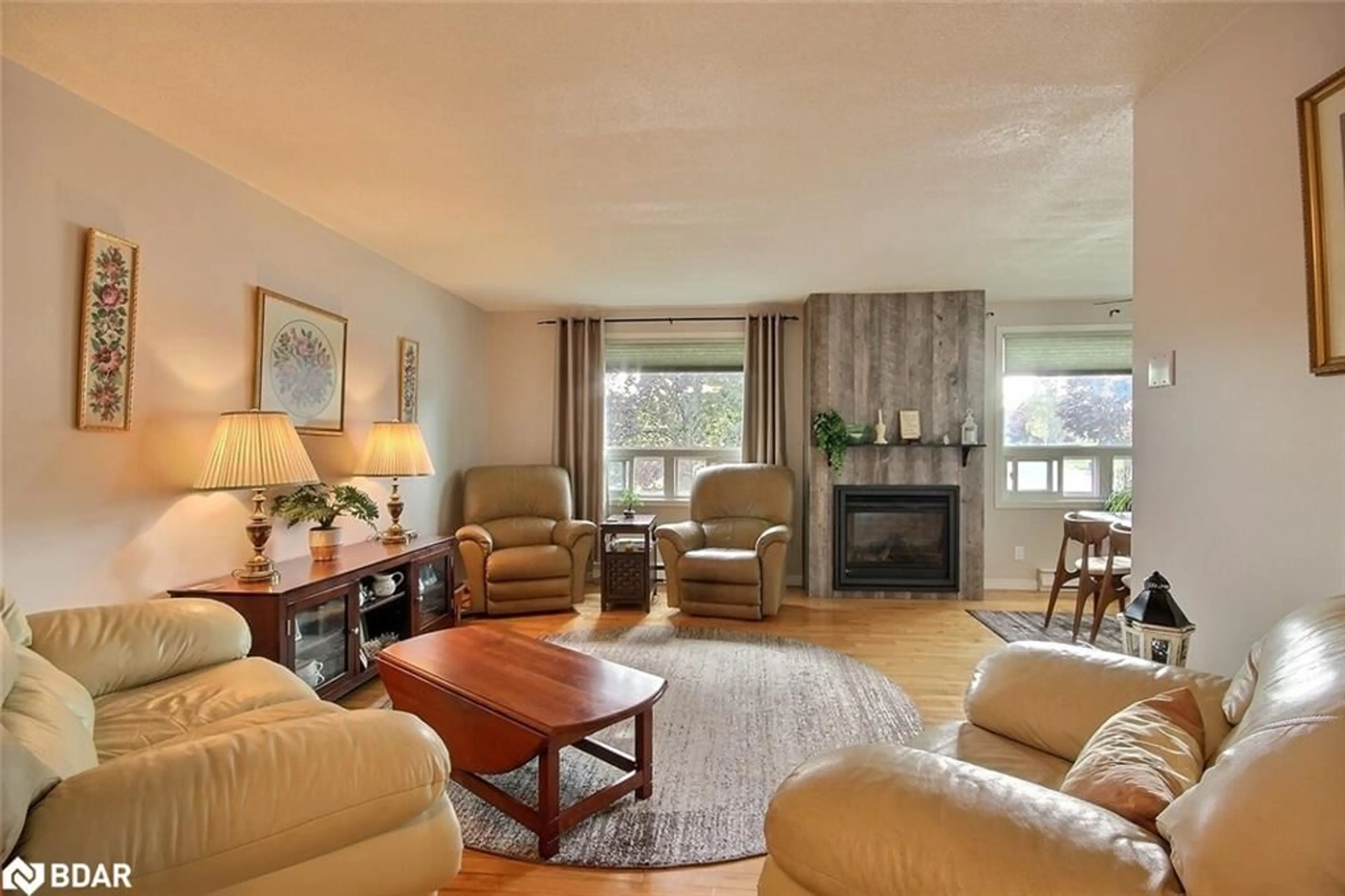 Living room with furniture, wood/laminate floor for 29 Patrick St, Trenton Ontario K8V 4B4