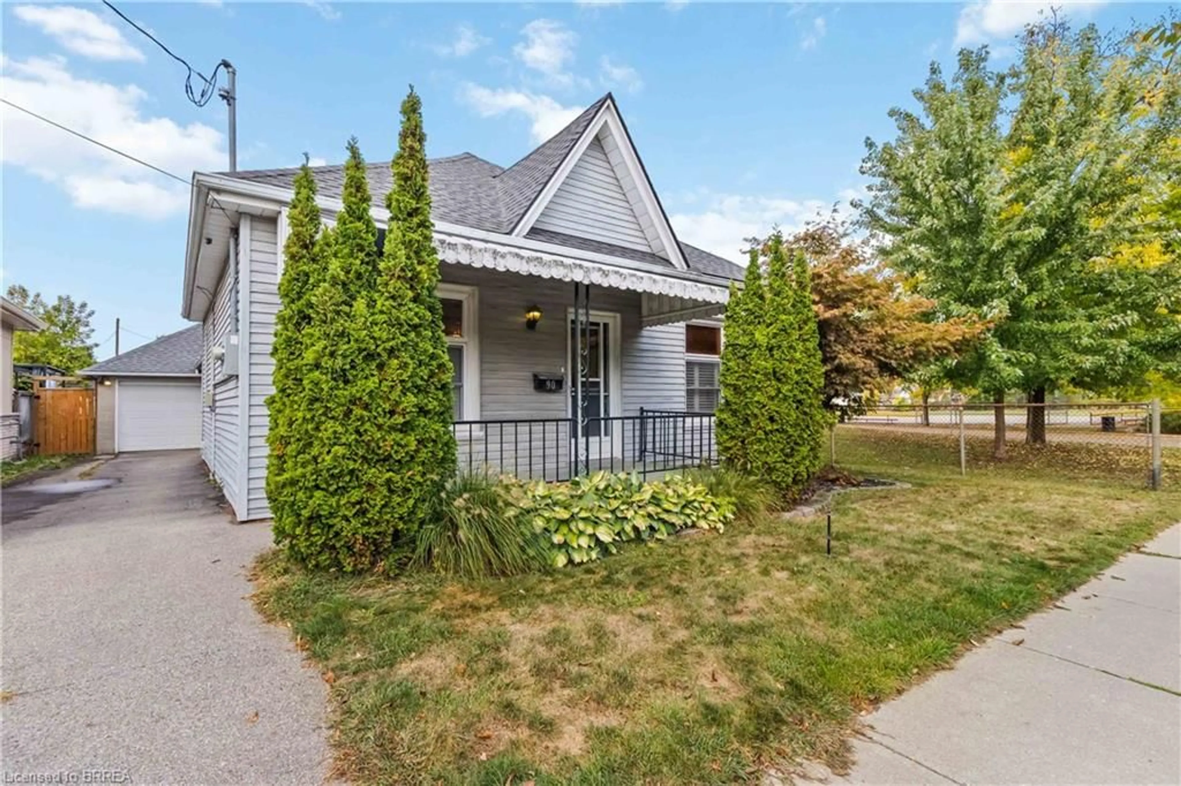 Home with vinyl exterior material, street for 90 Grand St, Brantford Ontario N3R 4B6