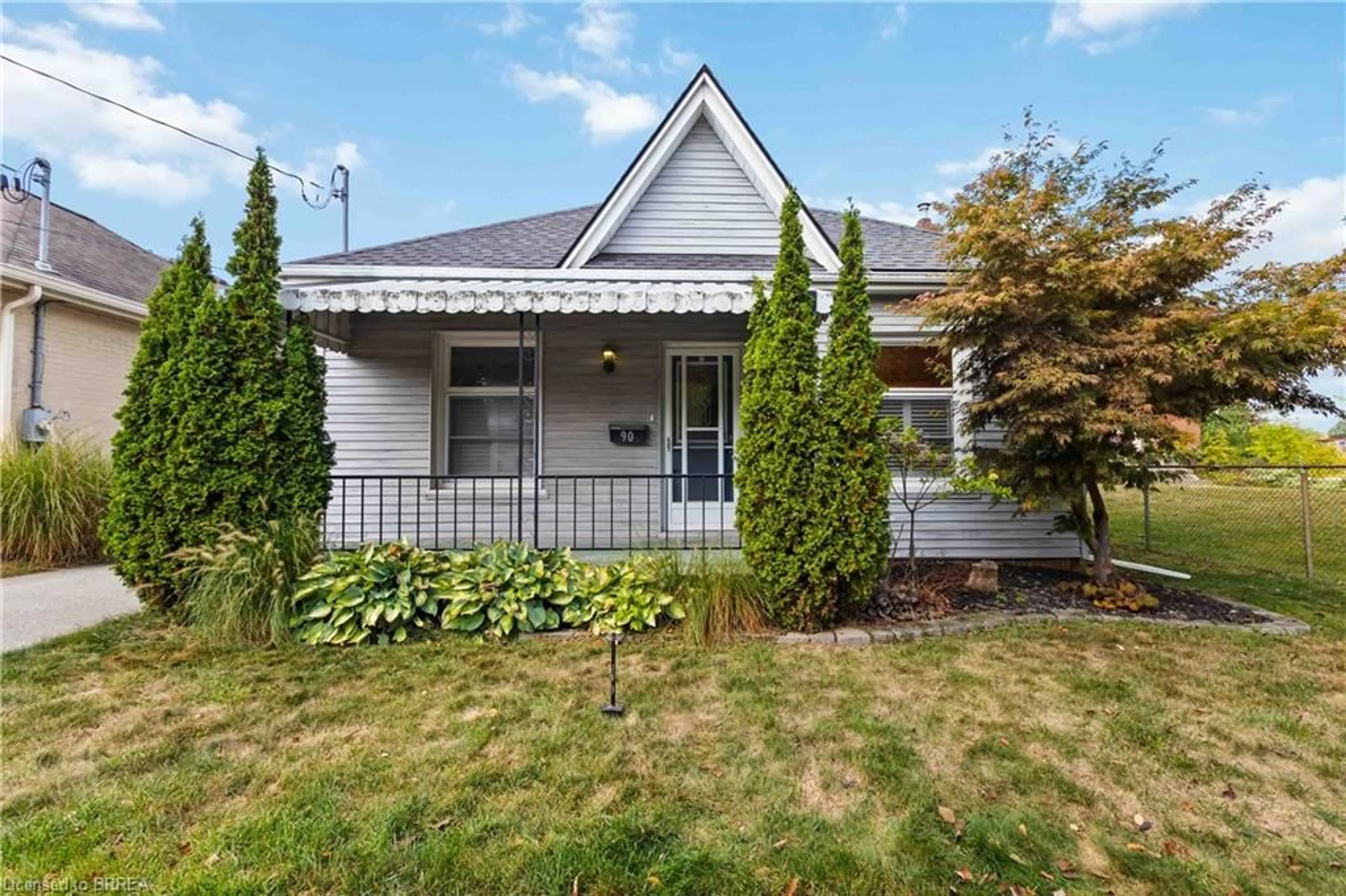 Home with vinyl exterior material, street for 90 Grand St, Brantford Ontario N3R 4B6