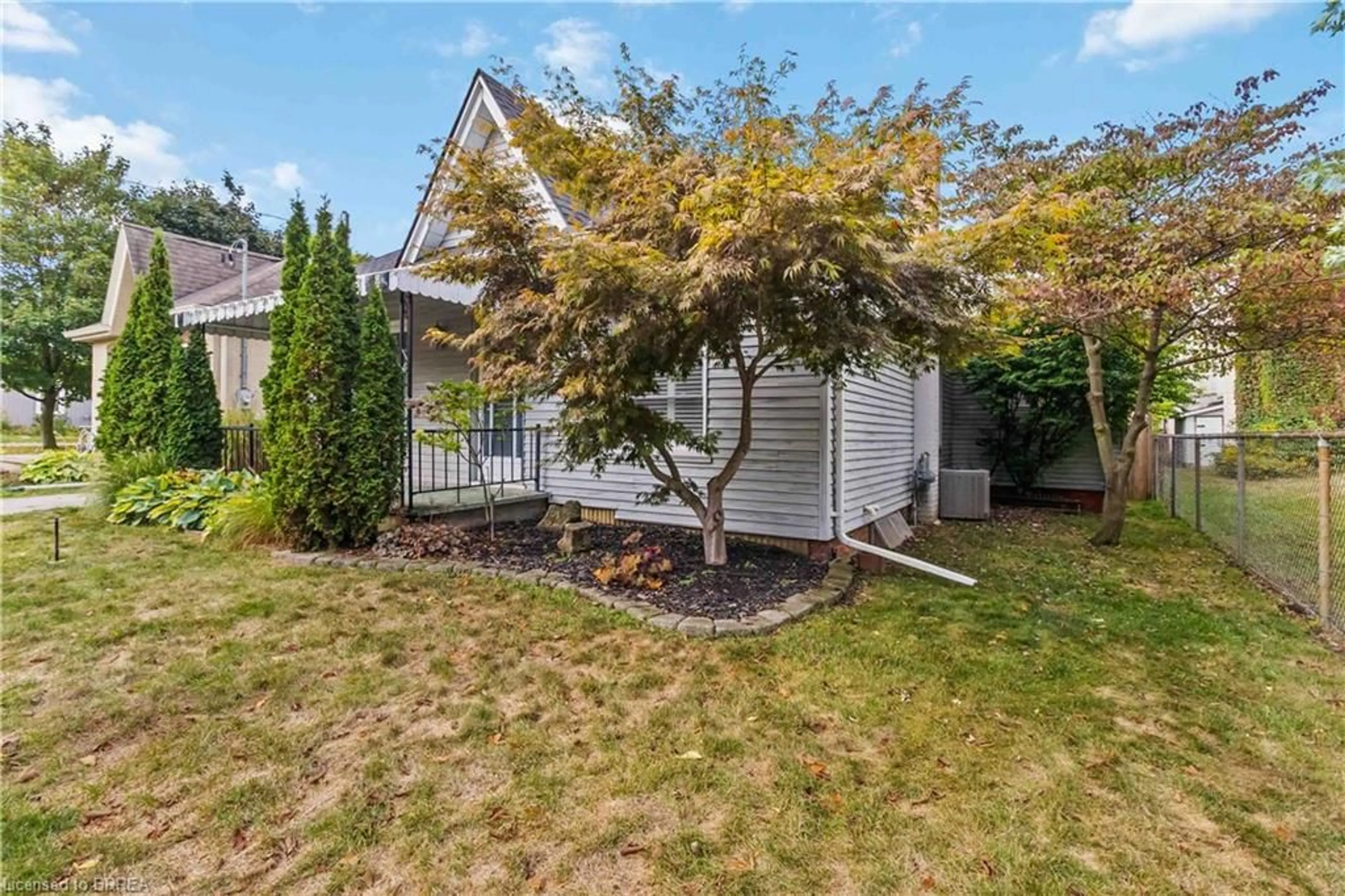 Home with vinyl exterior material, street for 90 Grand St, Brantford Ontario N3R 4B6