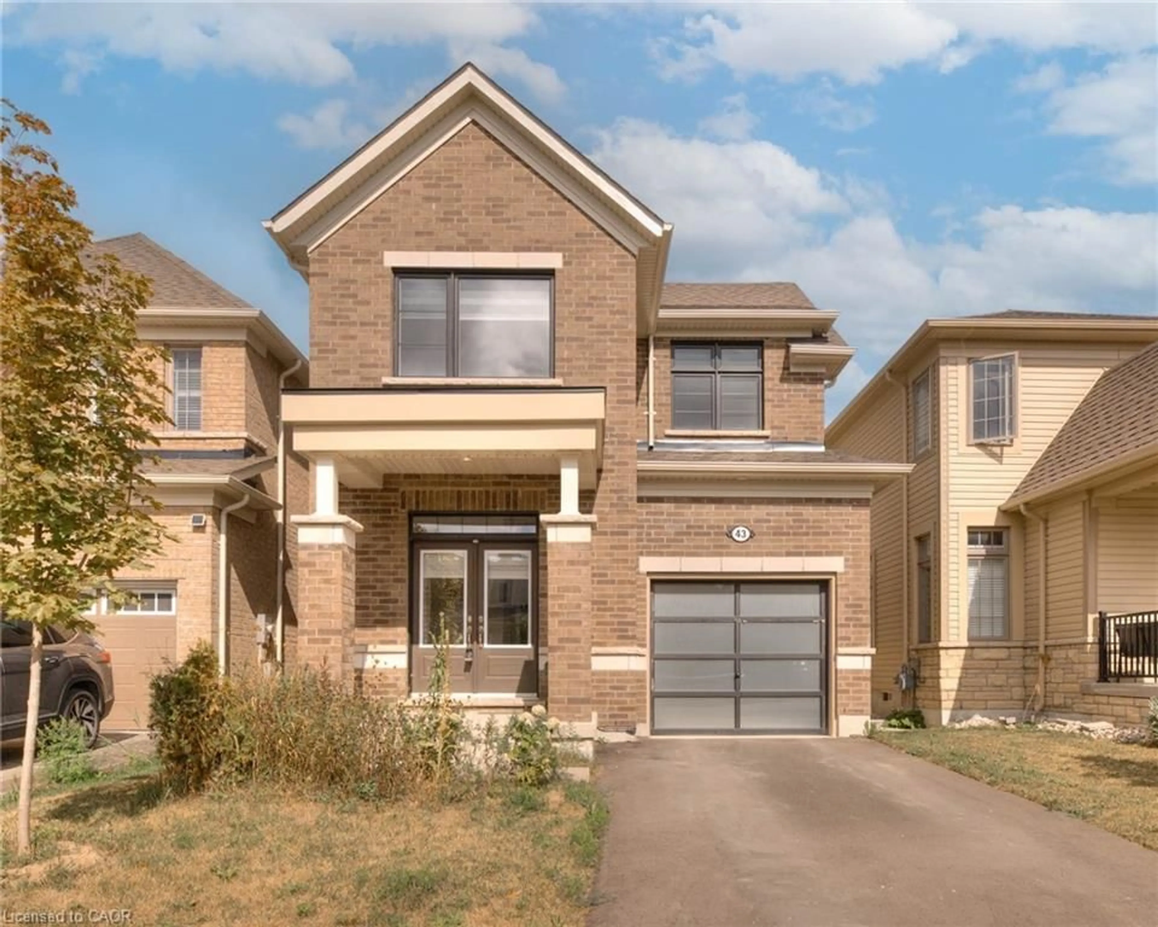 Home with brick exterior material, street for 43 Dass Dr, Fergus Ontario N1M 0H9