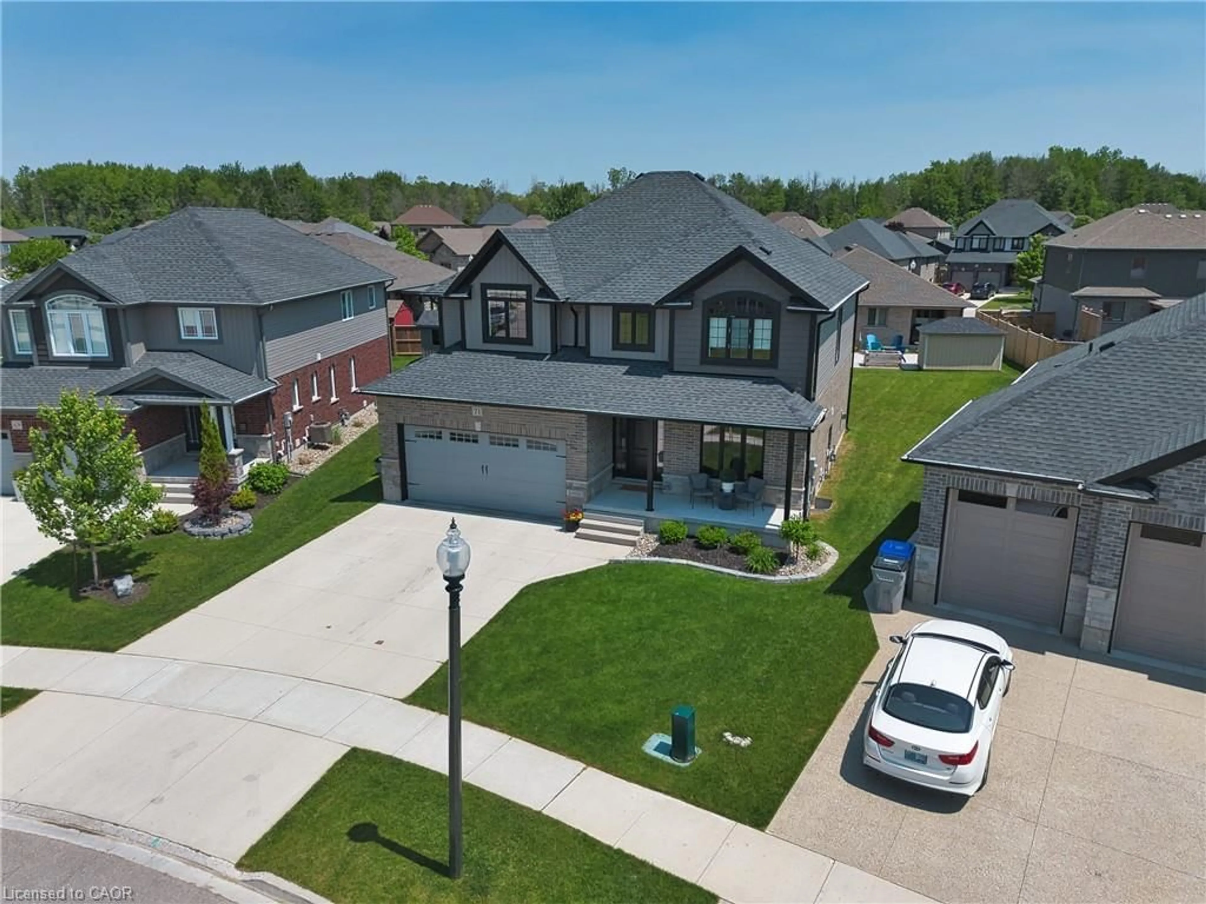 A pic from outside/outdoor area/front of a property/back of a property/a pic from drone, street for 71 Forbes Cres, Listowel Ontario N4W 0B8