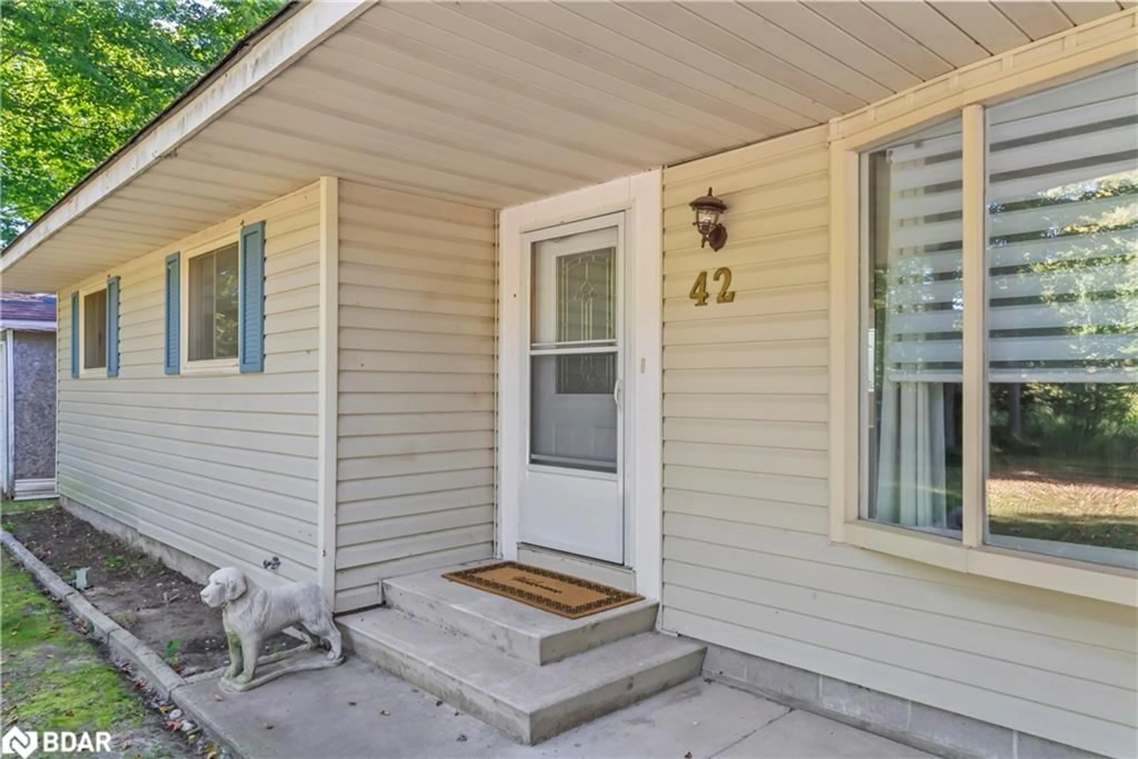Home with vinyl exterior material, street for 42 Birch St, Sauble Beach Ontario N0H 5G0