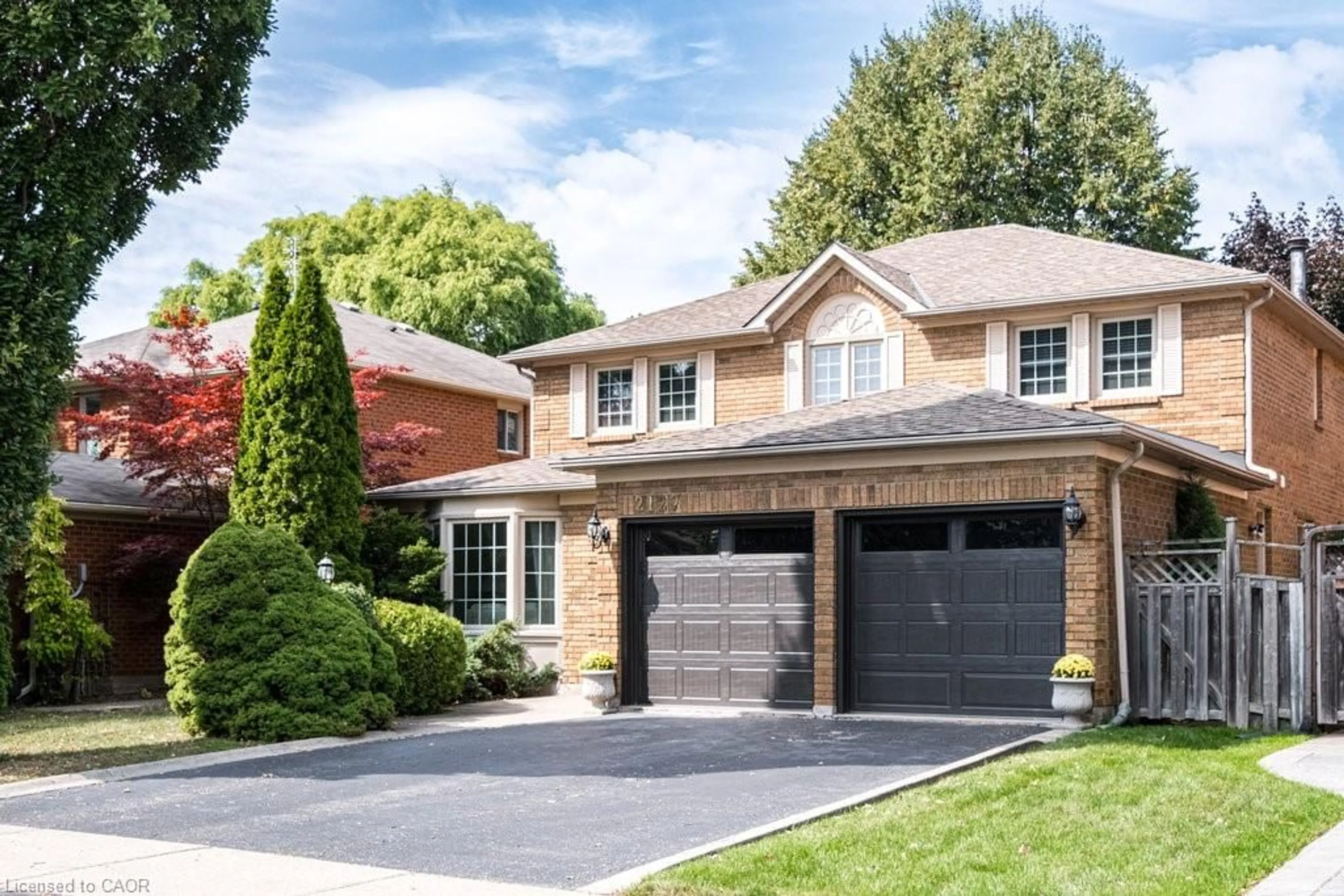 Home with brick exterior material, street for 2127 Brays Lane, Oakville Ontario L6M 2T2