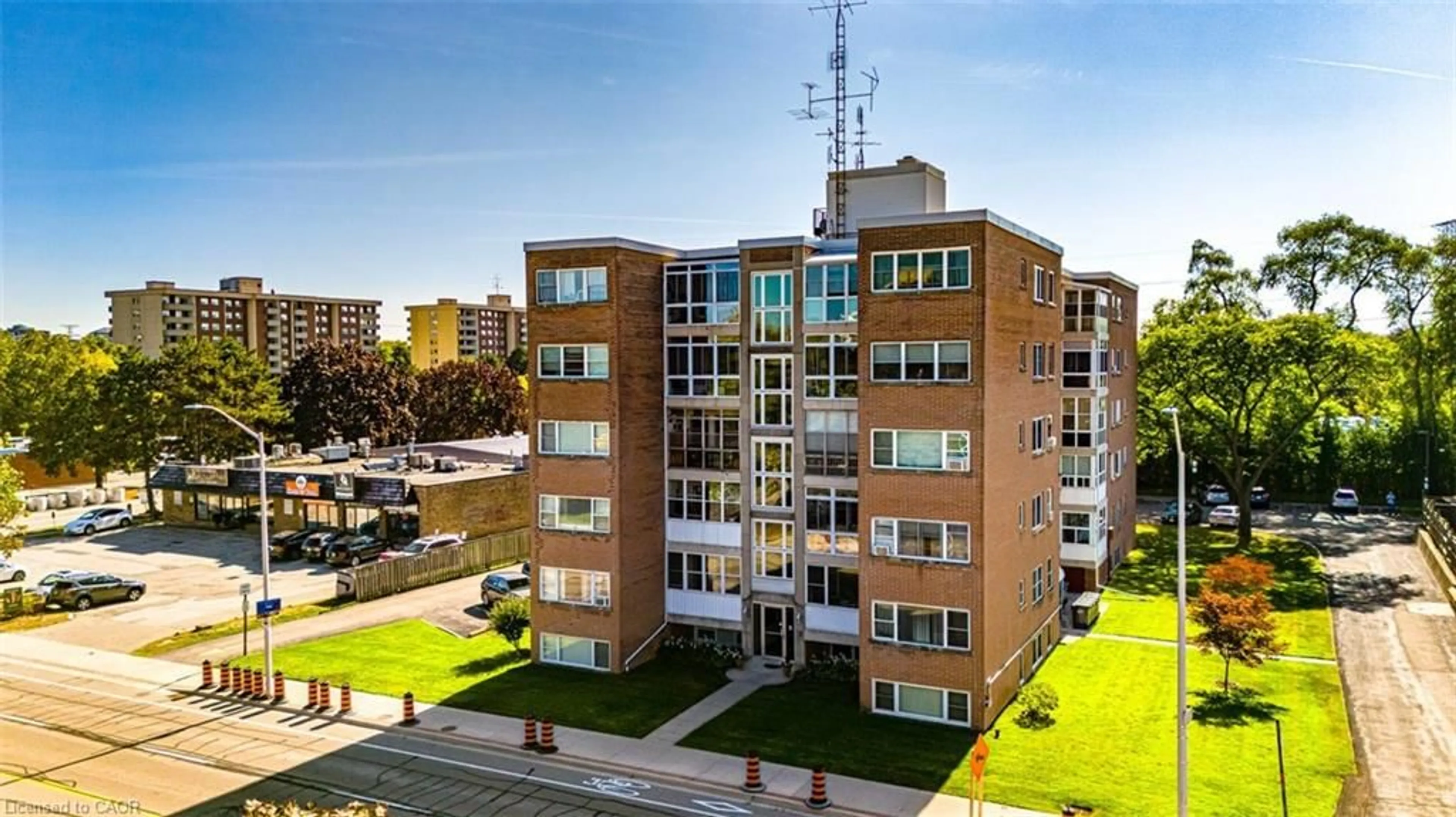 A pic from outside/outdoor area/front of a property/back of a property/a pic from drone, city buildings view from balcony for 824 Brant St #8, Burlington Ontario L7R 2J5