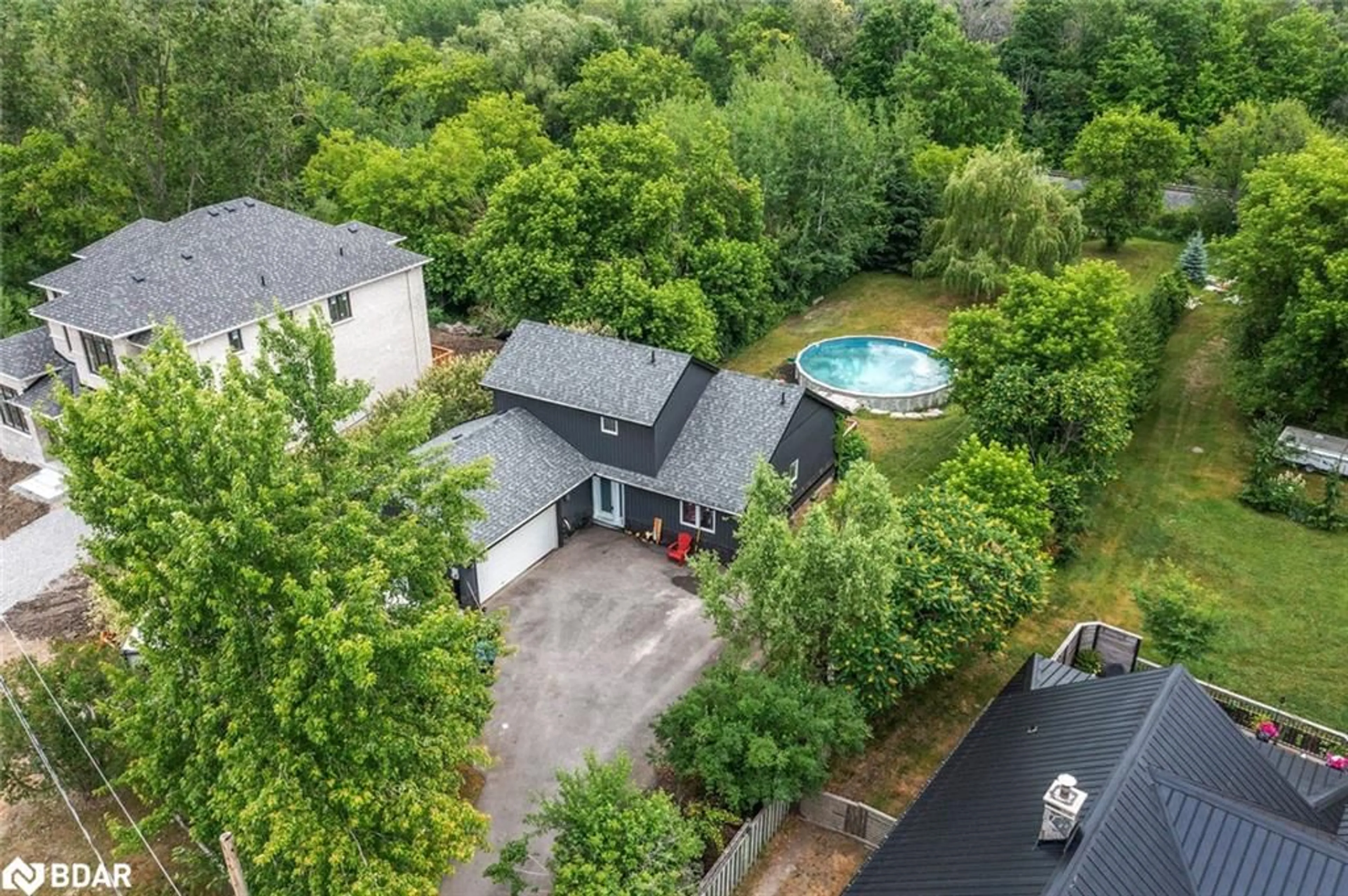 A pic from outside/outdoor area/front of a property/back of a property/a pic from drone, unknown for 973 Church Dr, Innisfil Ontario L0L 1W0