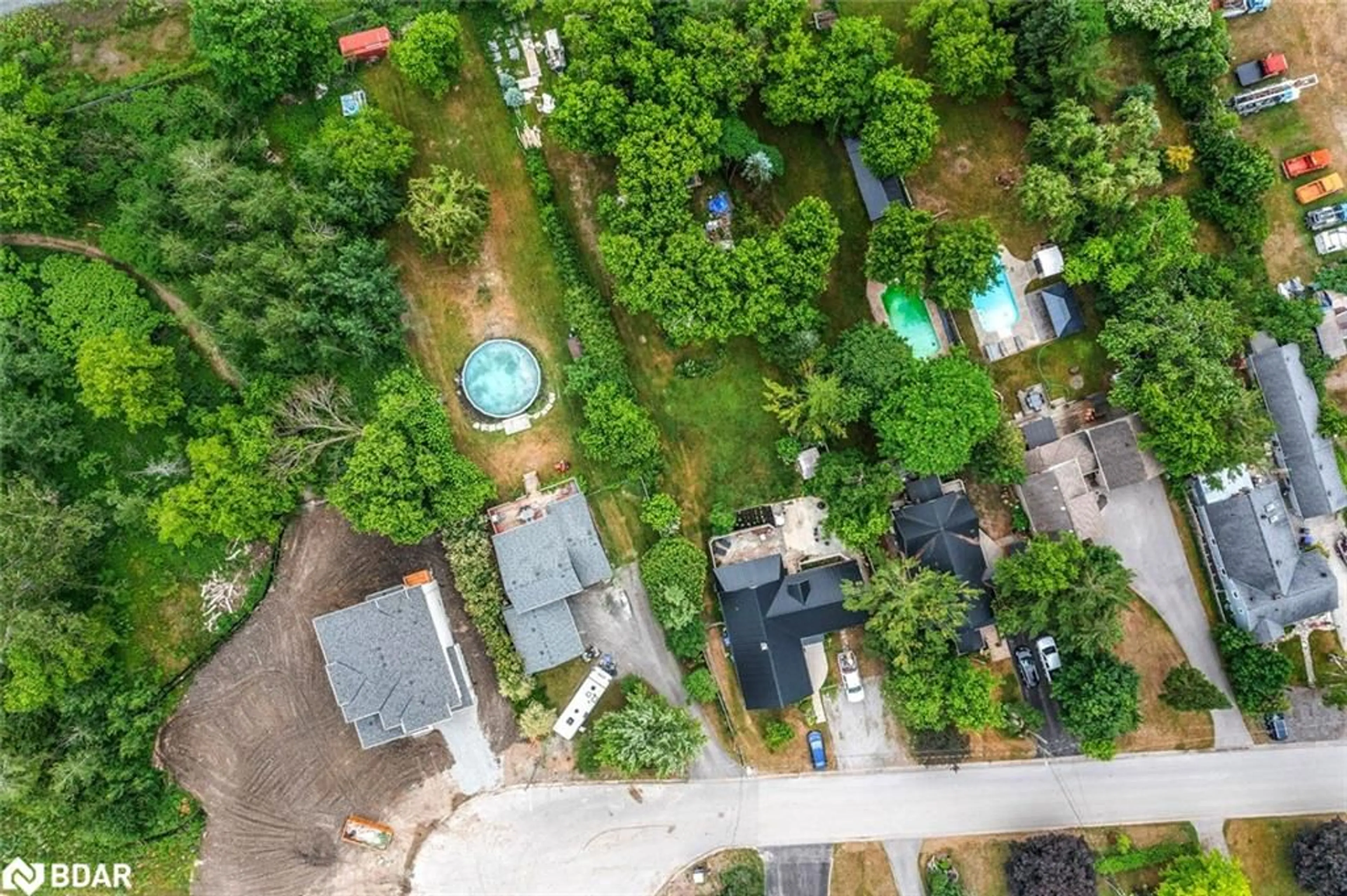 A pic from outside/outdoor area/front of a property/back of a property/a pic from drone, unknown for 973 Church Dr, Innisfil Ontario L0L 1W0