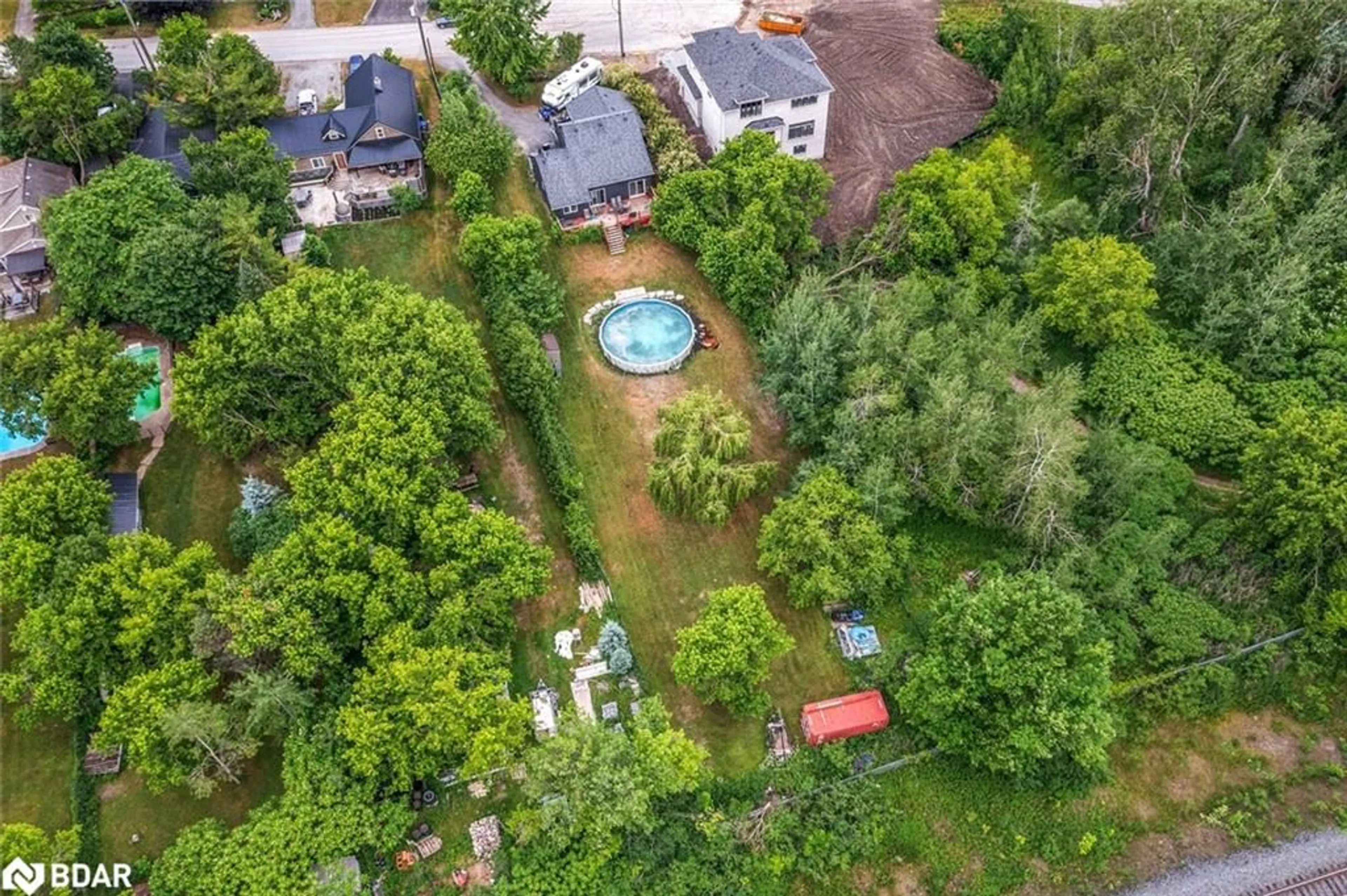 A pic from outside/outdoor area/front of a property/back of a property/a pic from drone, unknown for 973 Church Dr, Innisfil Ontario L0L 1W0