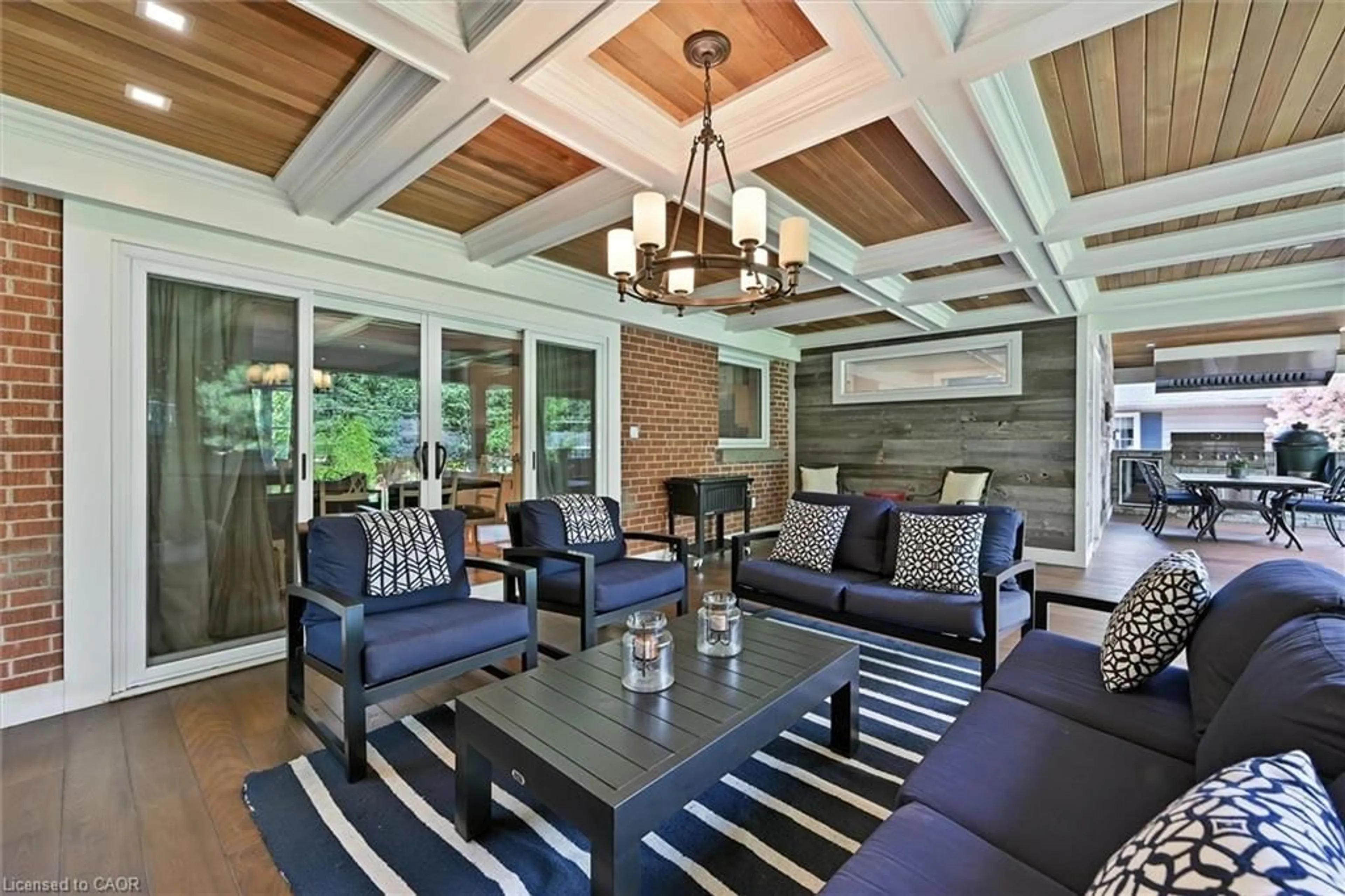 Living room with furniture, wood/laminate floor for 2147 Paisley Ave, Burlington Ontario L7R 1W1