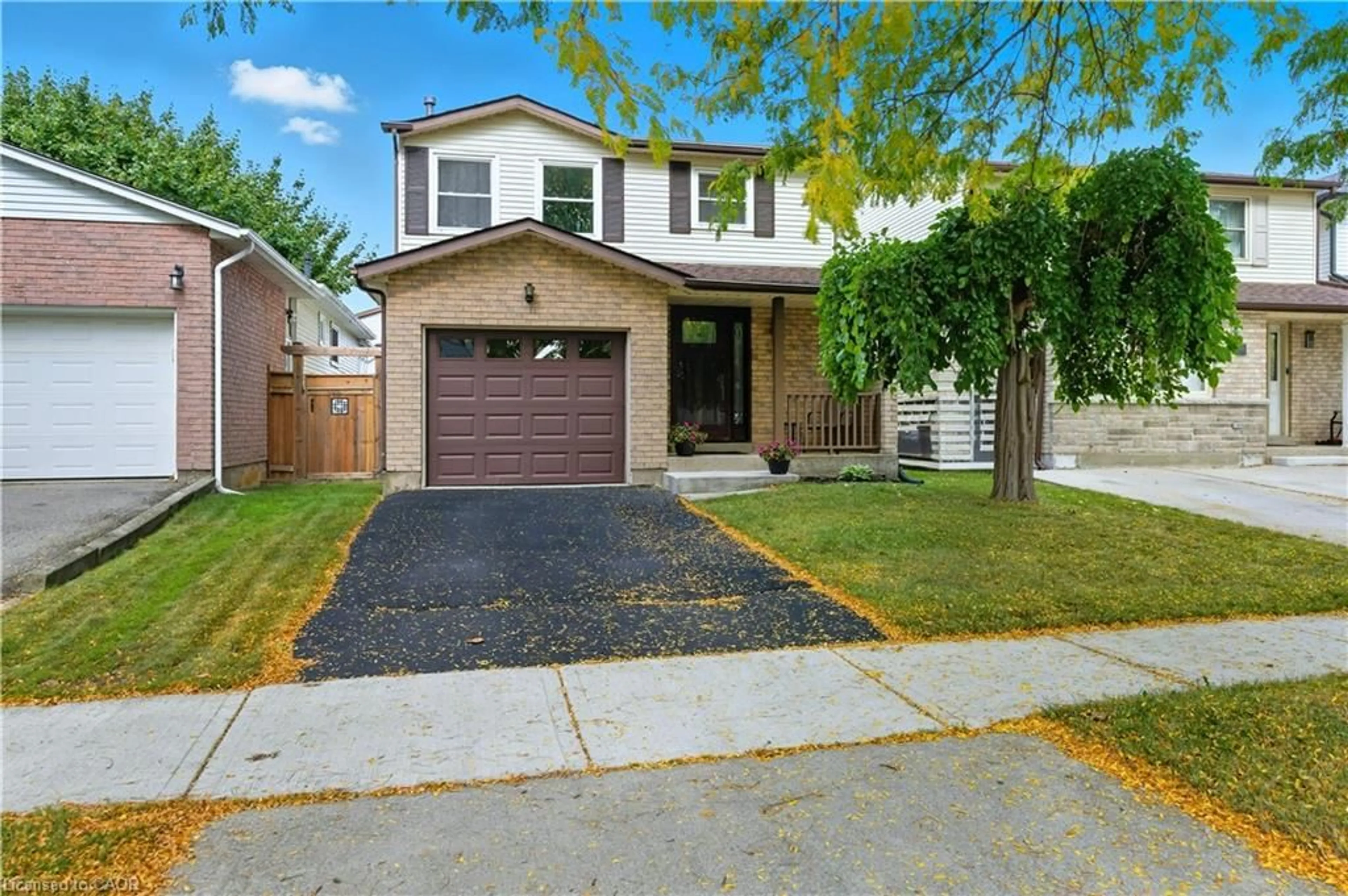 Home with vinyl exterior material, street for 56 Muscot Dr, Hamilton Ontario L8J 2B3