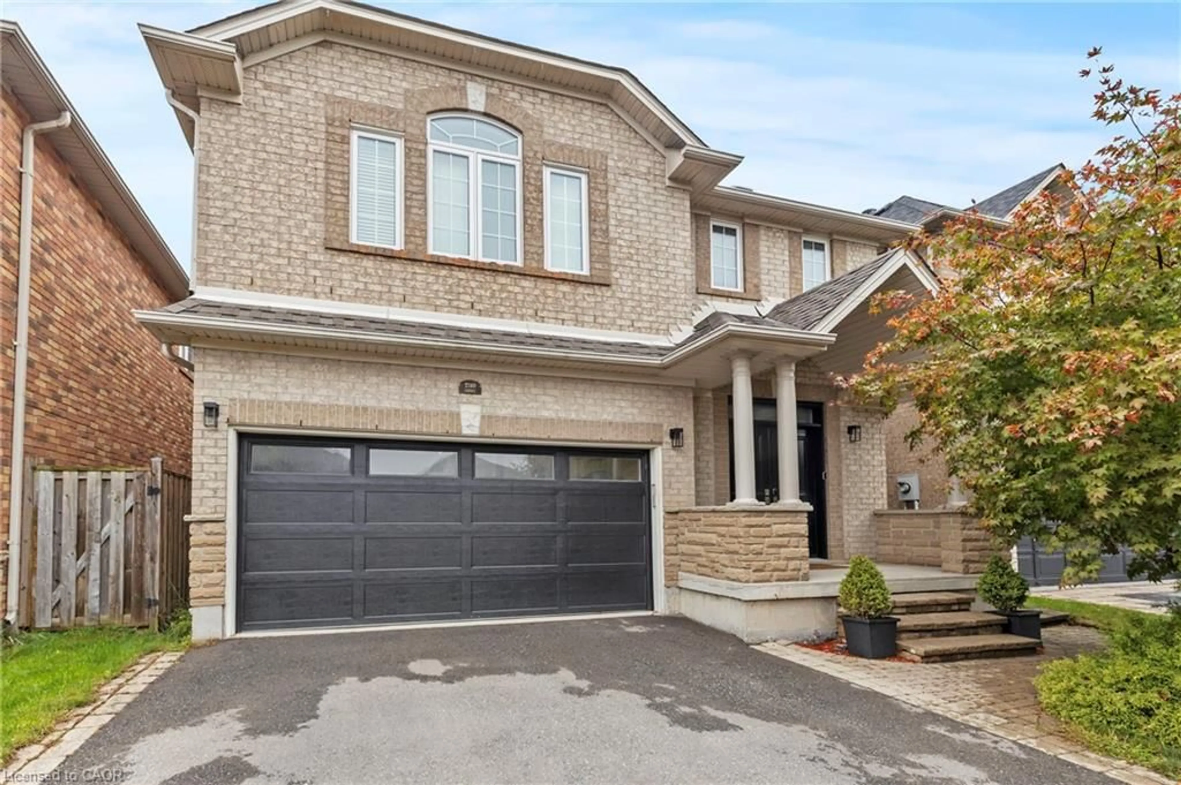 Home with brick exterior material, street for 2240 Osprey Lane, Oakville Ontario L6M 3Z8