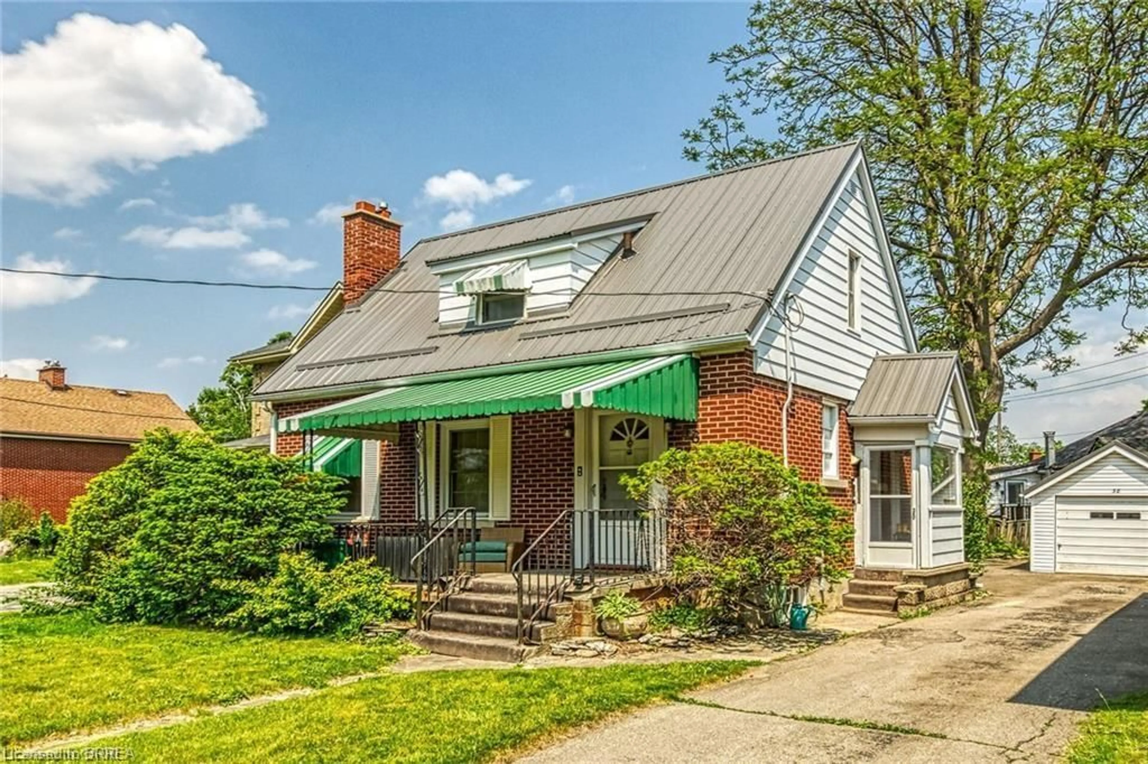 Home with brick exterior material, street for 58 Mount Pleasant St, Brantford Ontario N3T 1S8