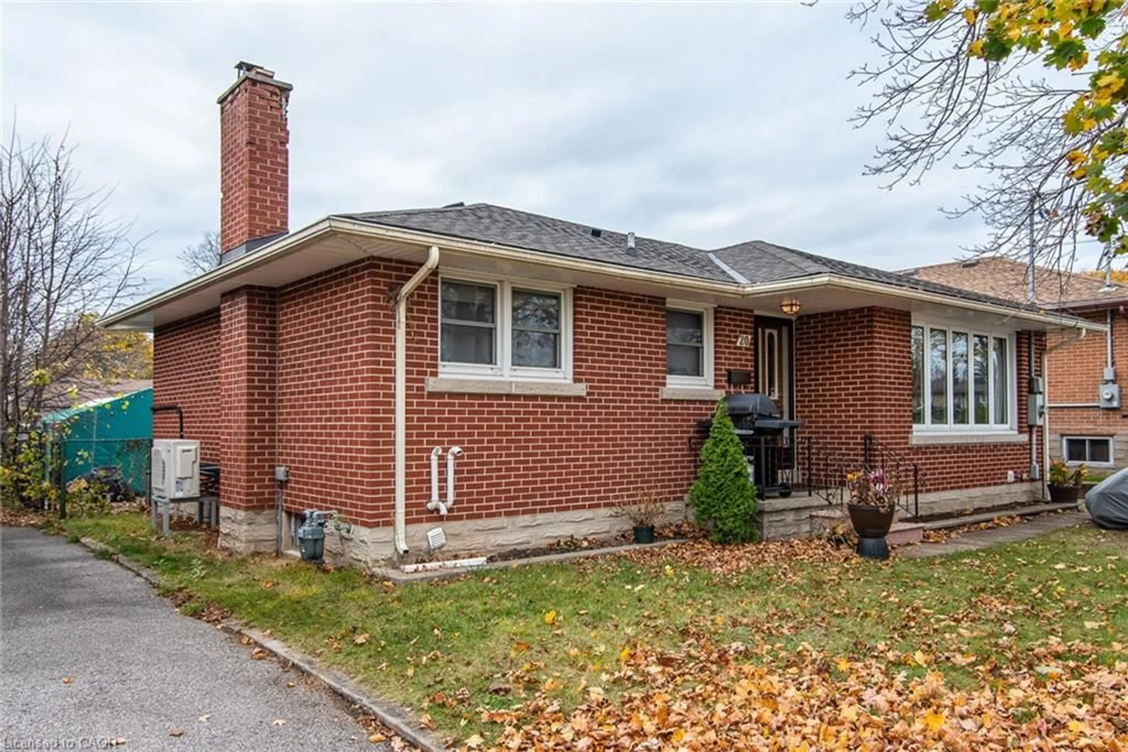 Home with brick exterior material, street for 20 Delmar Blvd, Guelph Ontario N1E 2K8