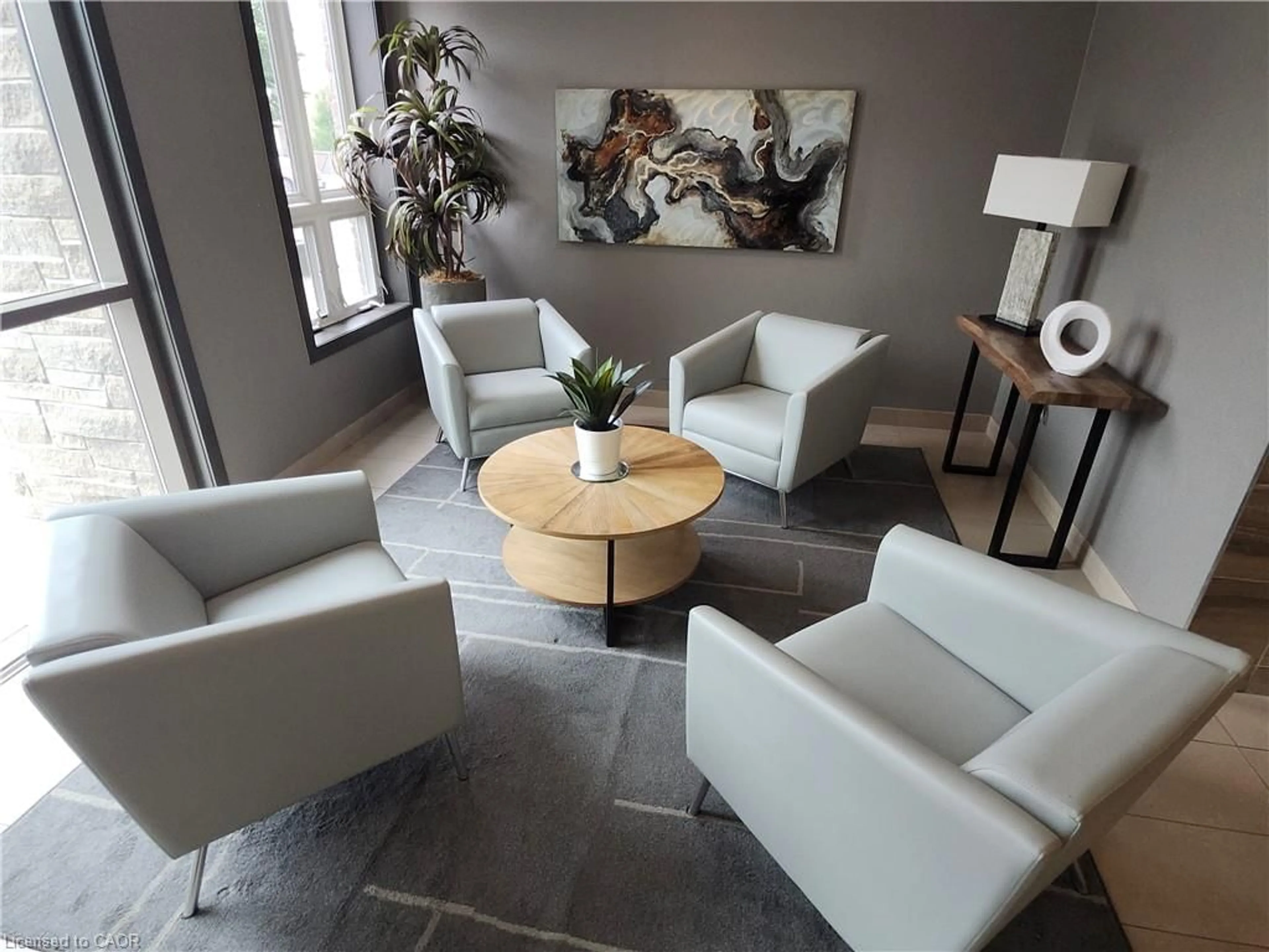 Living room with furniture, unknown for 5010 Corporate Dr #317, Burlington Ontario L7H 0H6