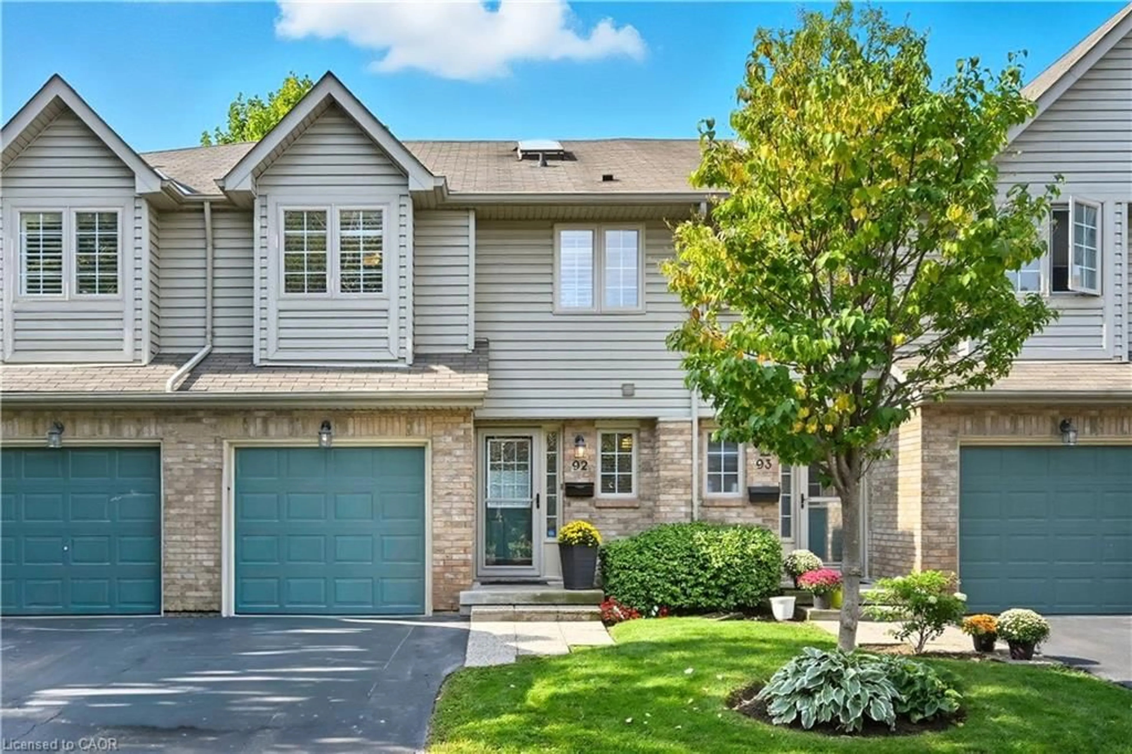 Home with brick exterior material, street for 3333 New St #92, Burlington Ontario L7N 1N1