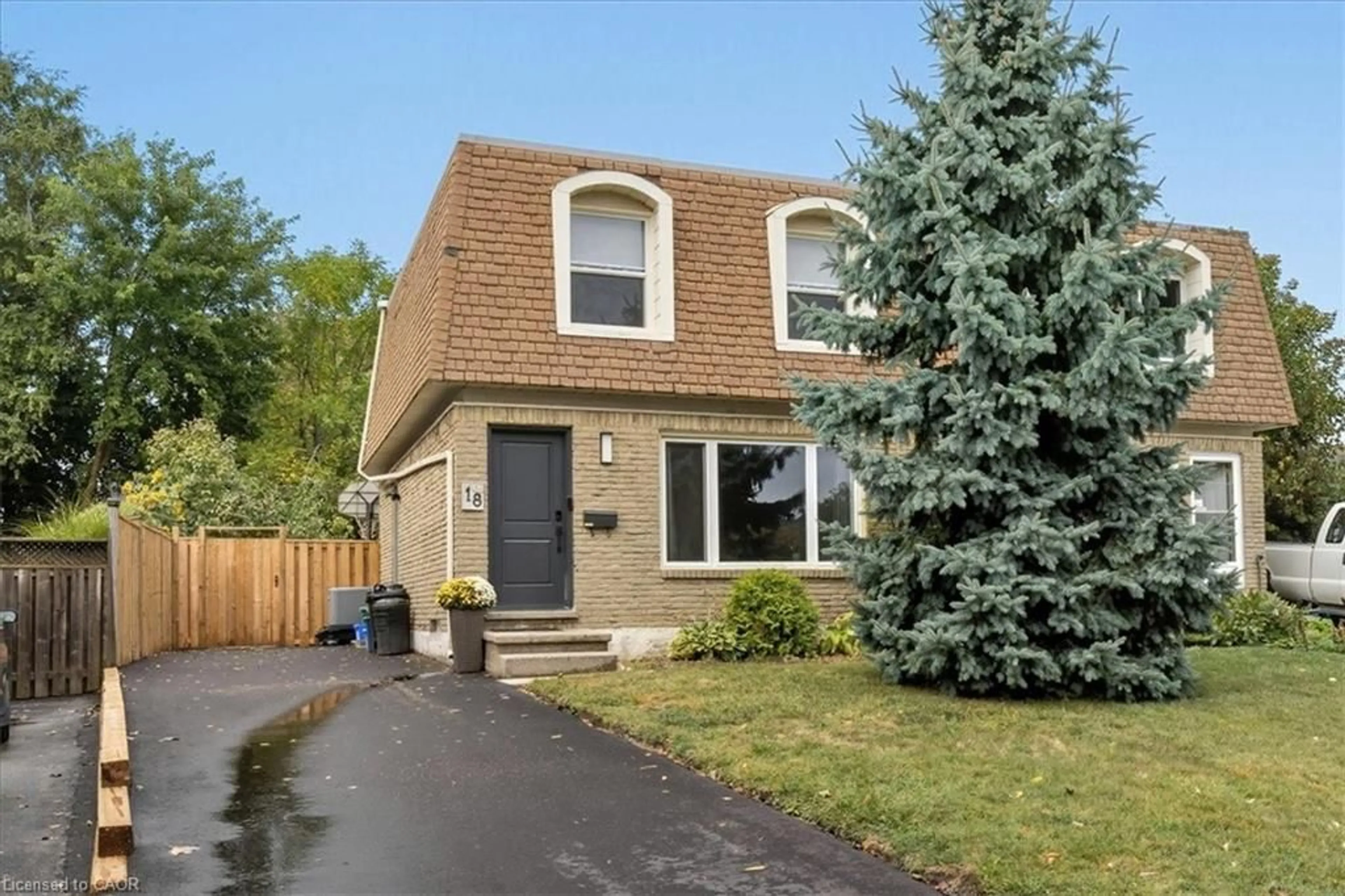 Home with brick exterior material, street for 18 Berwick Pl, Kitchener Ontario N2A 2R7
