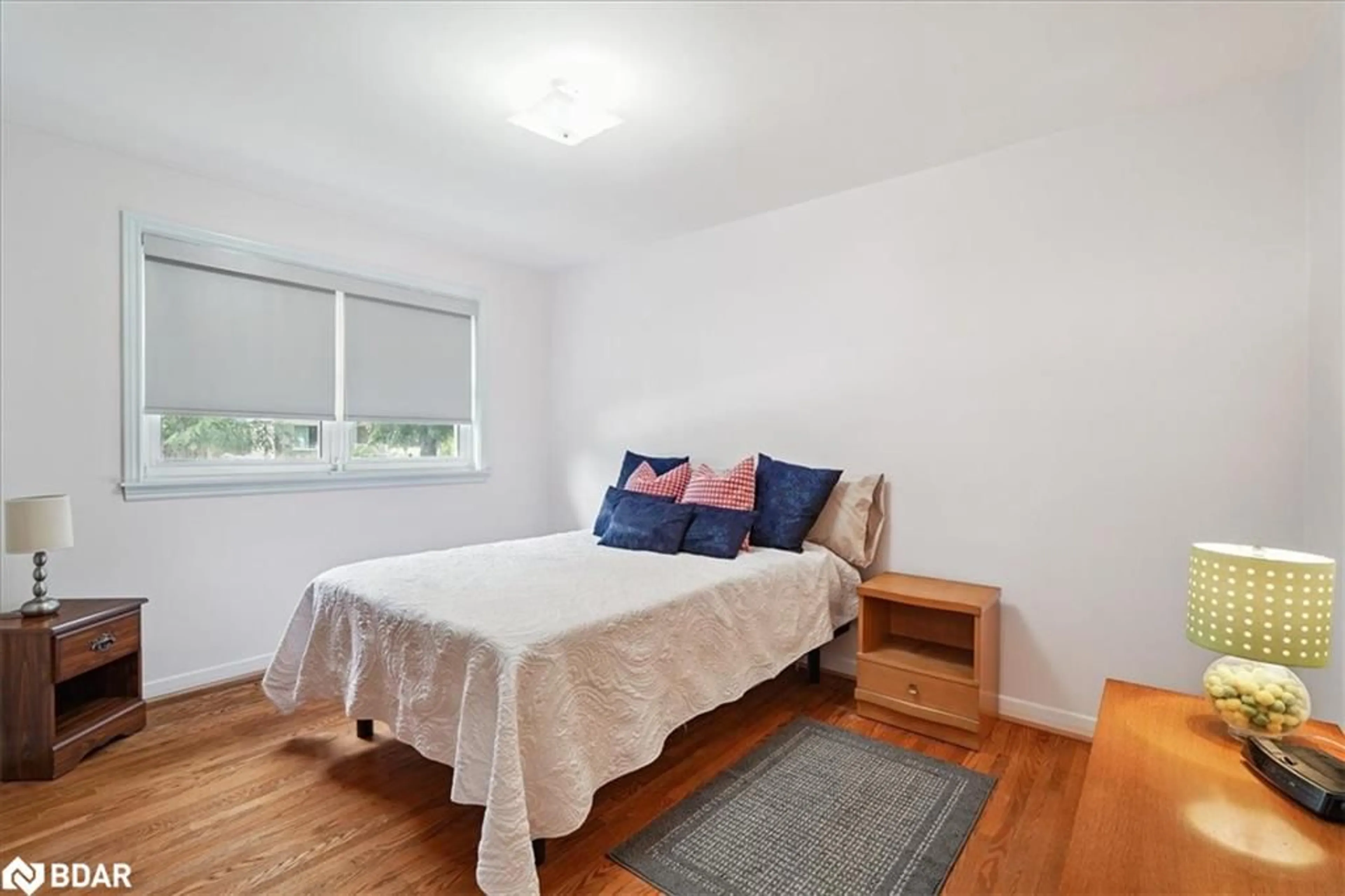 Bedroom with bed, wood/laminate floor for 195 Toynbee Trail, Toronto Ontario M1E 1G5