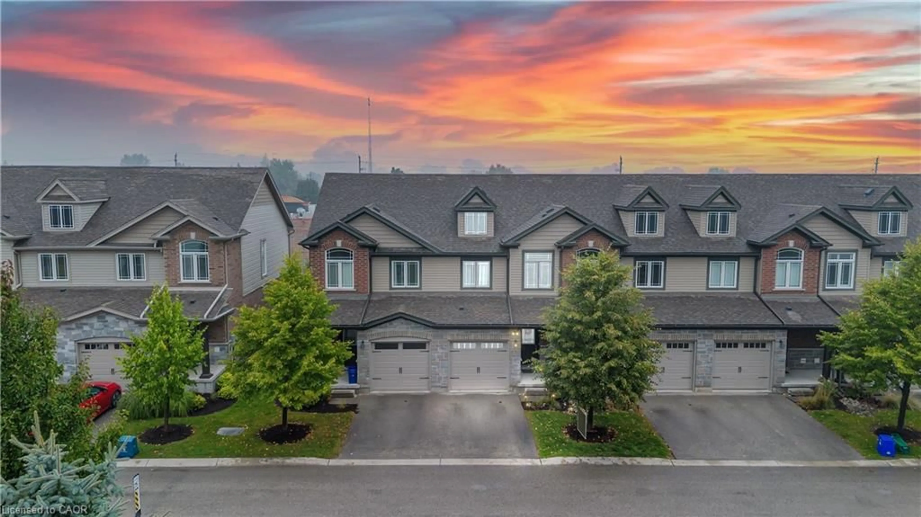 A pic from outside/outdoor area/front of a property/back of a property/a pic from drone, unknown for 77 Westminster Cres #77W, Fergus Ontario N1M 0C4