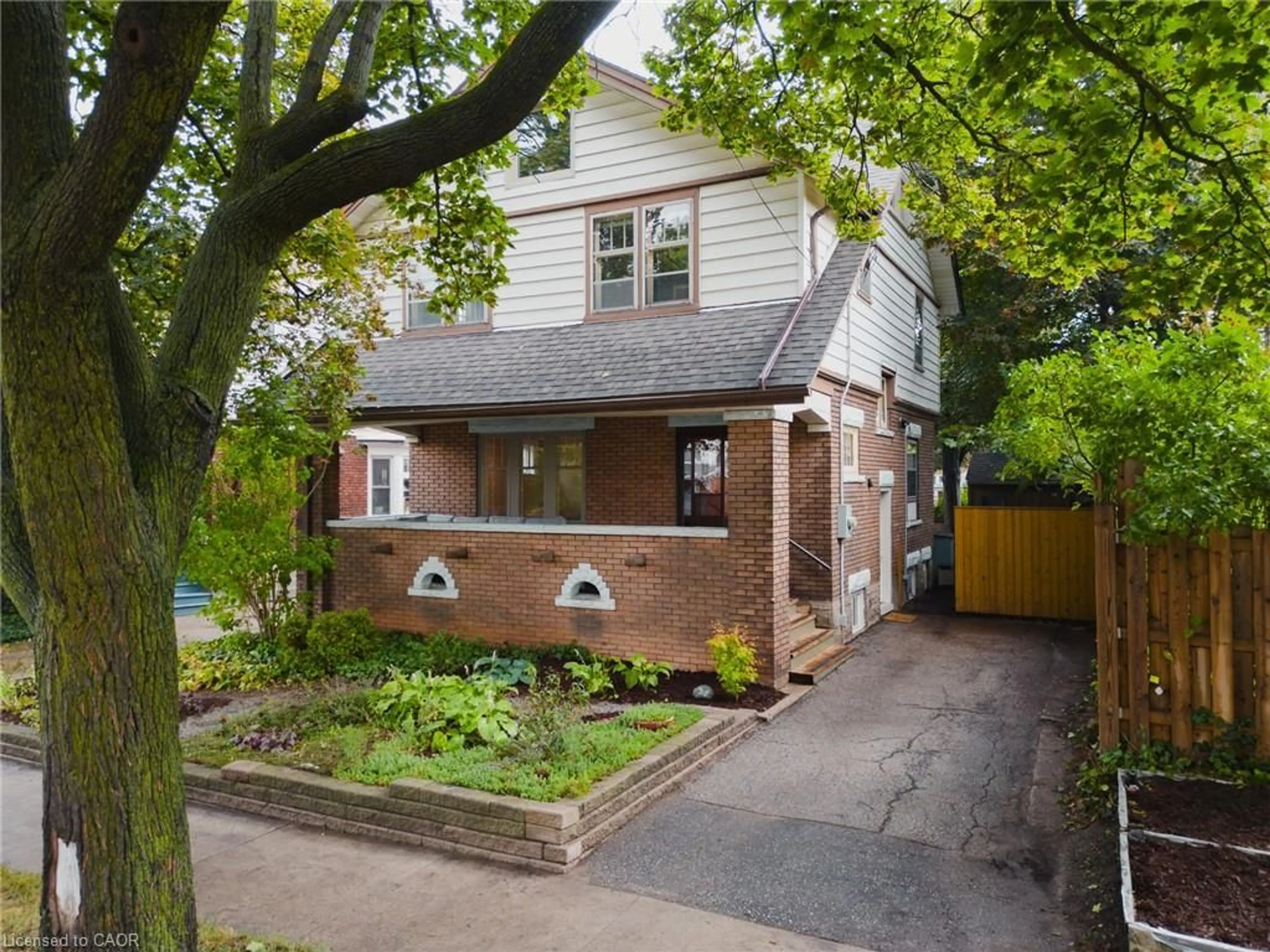 Home with brick exterior material, street for 81 Pandora Ave, Kitchener Ontario N2H 3C4
