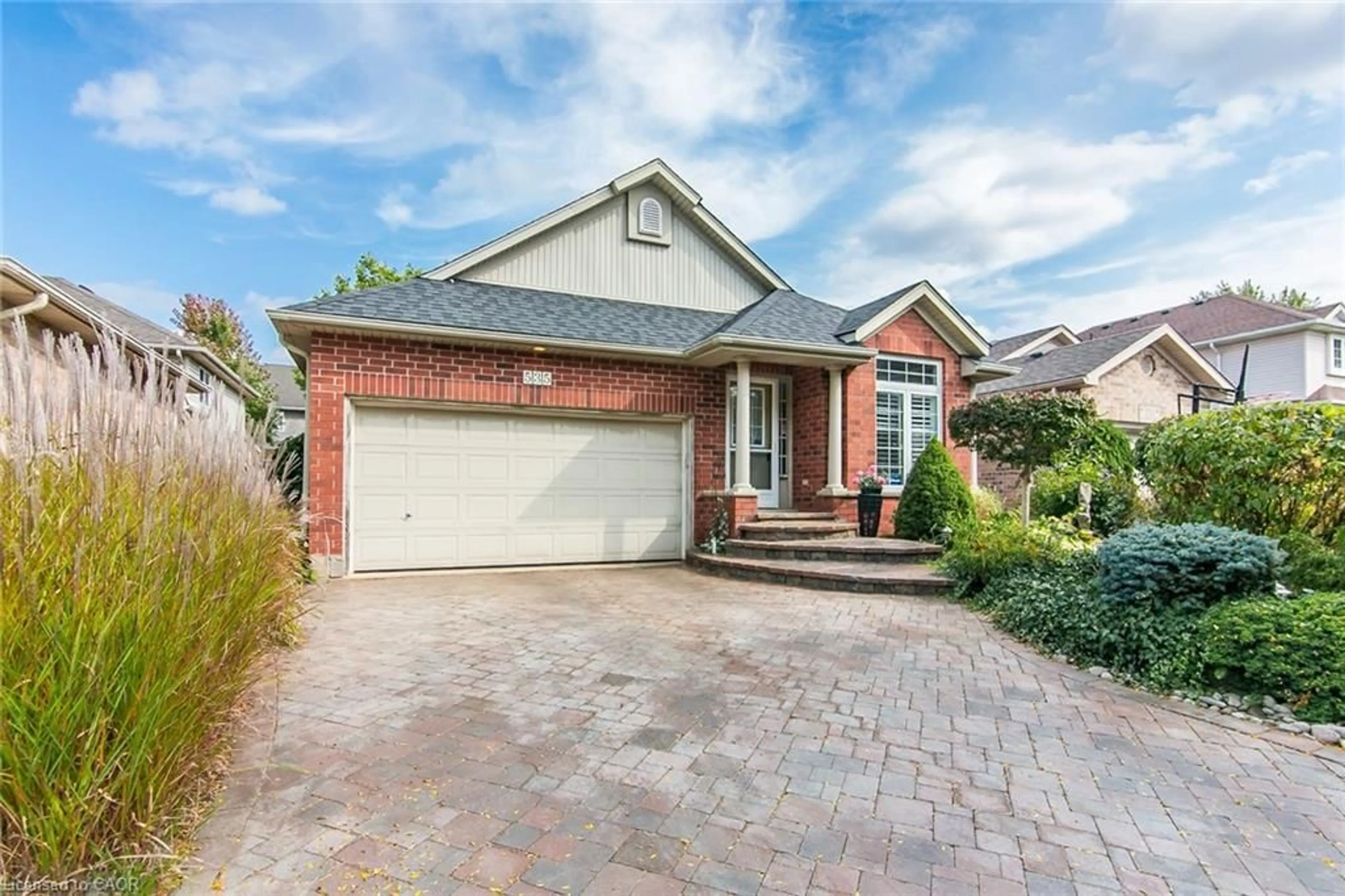 Home with brick exterior material, street for 535 Eastbridge Blvd, Waterloo Ontario N2K 3Z7