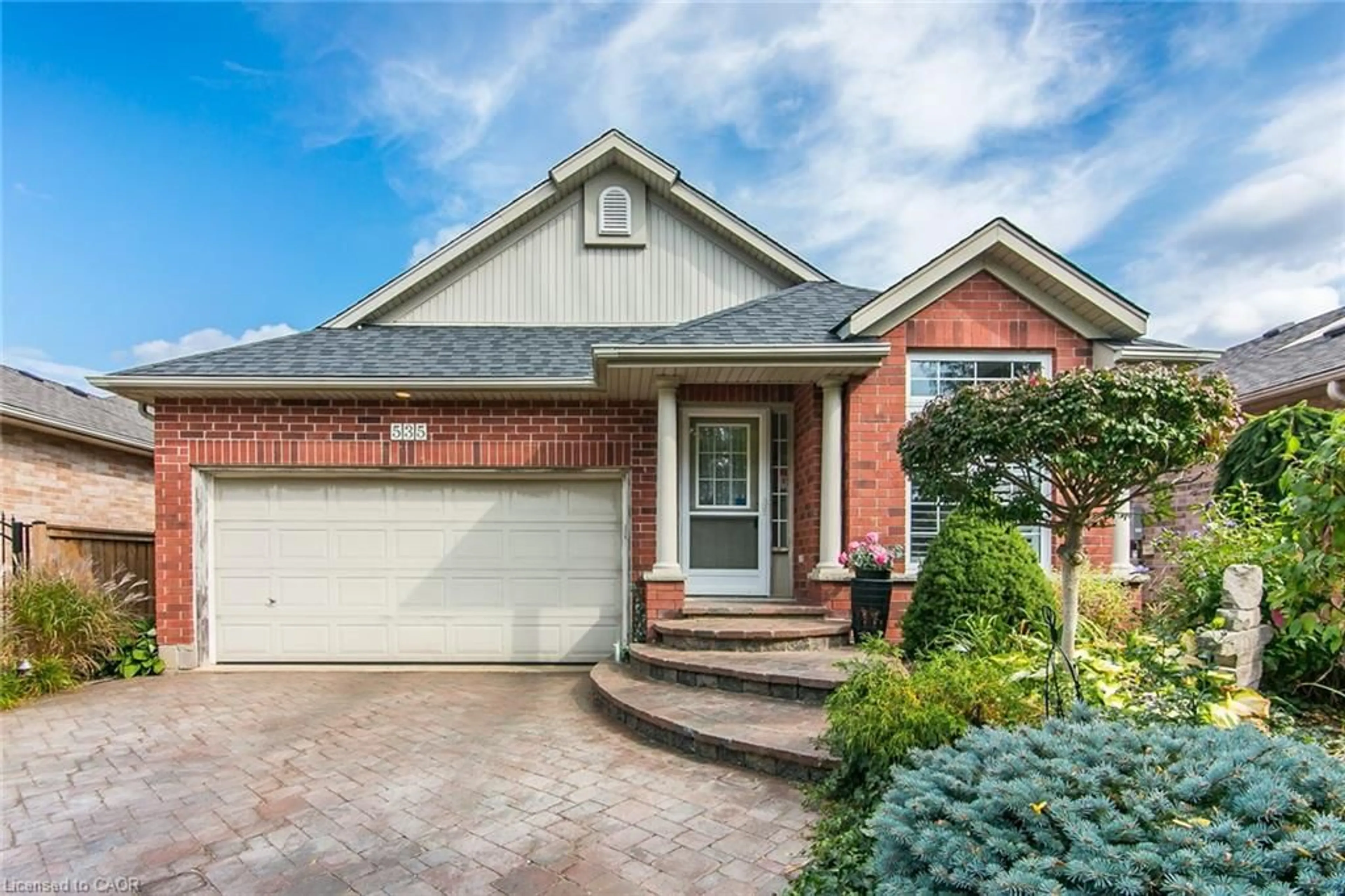 Home with brick exterior material, street for 535 Eastbridge Blvd, Waterloo Ontario N2K 3Z7