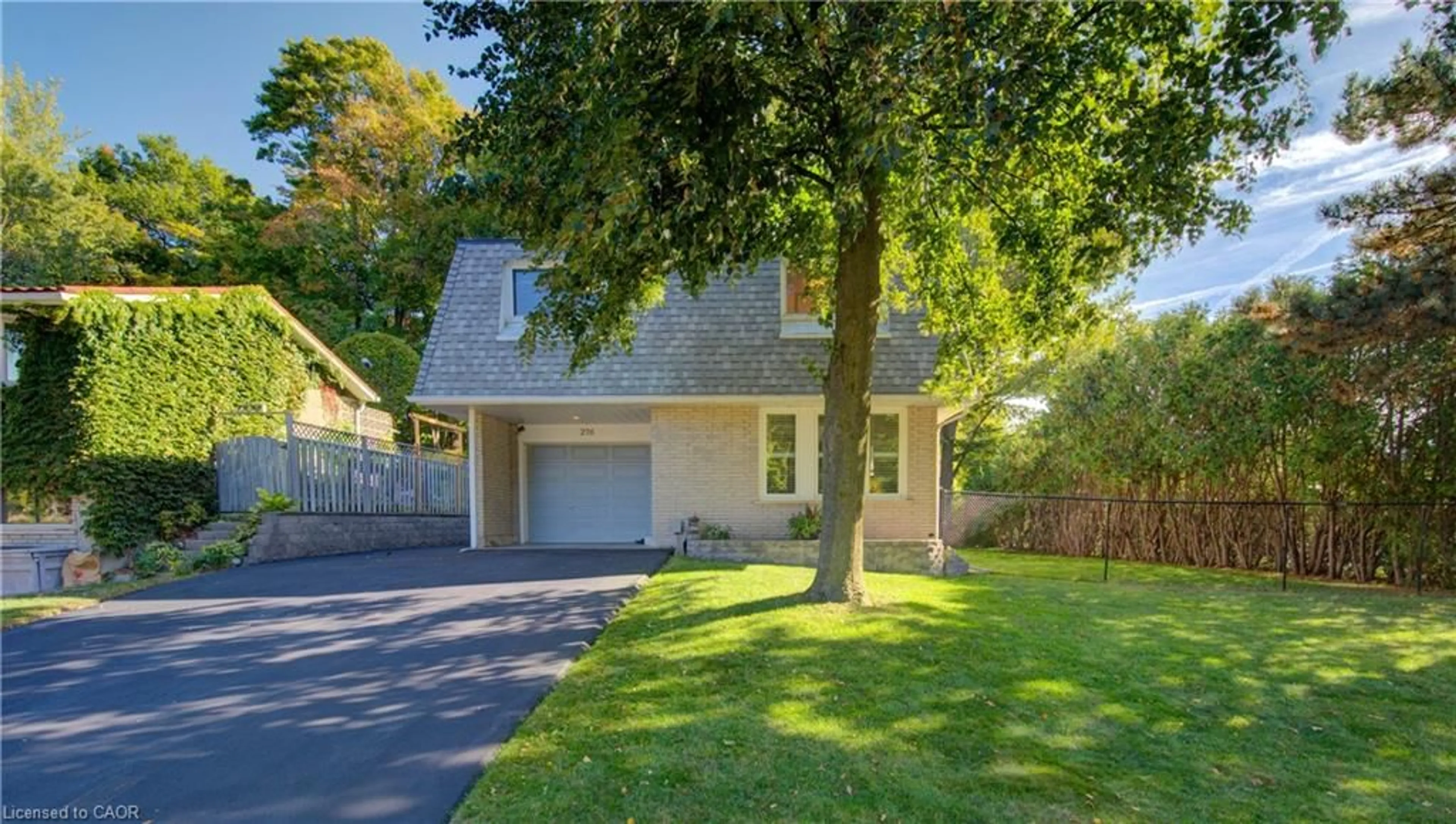 Home with vinyl exterior material, street for 276 Laurentian Dr, Kitchener Ontario N2E 2B6