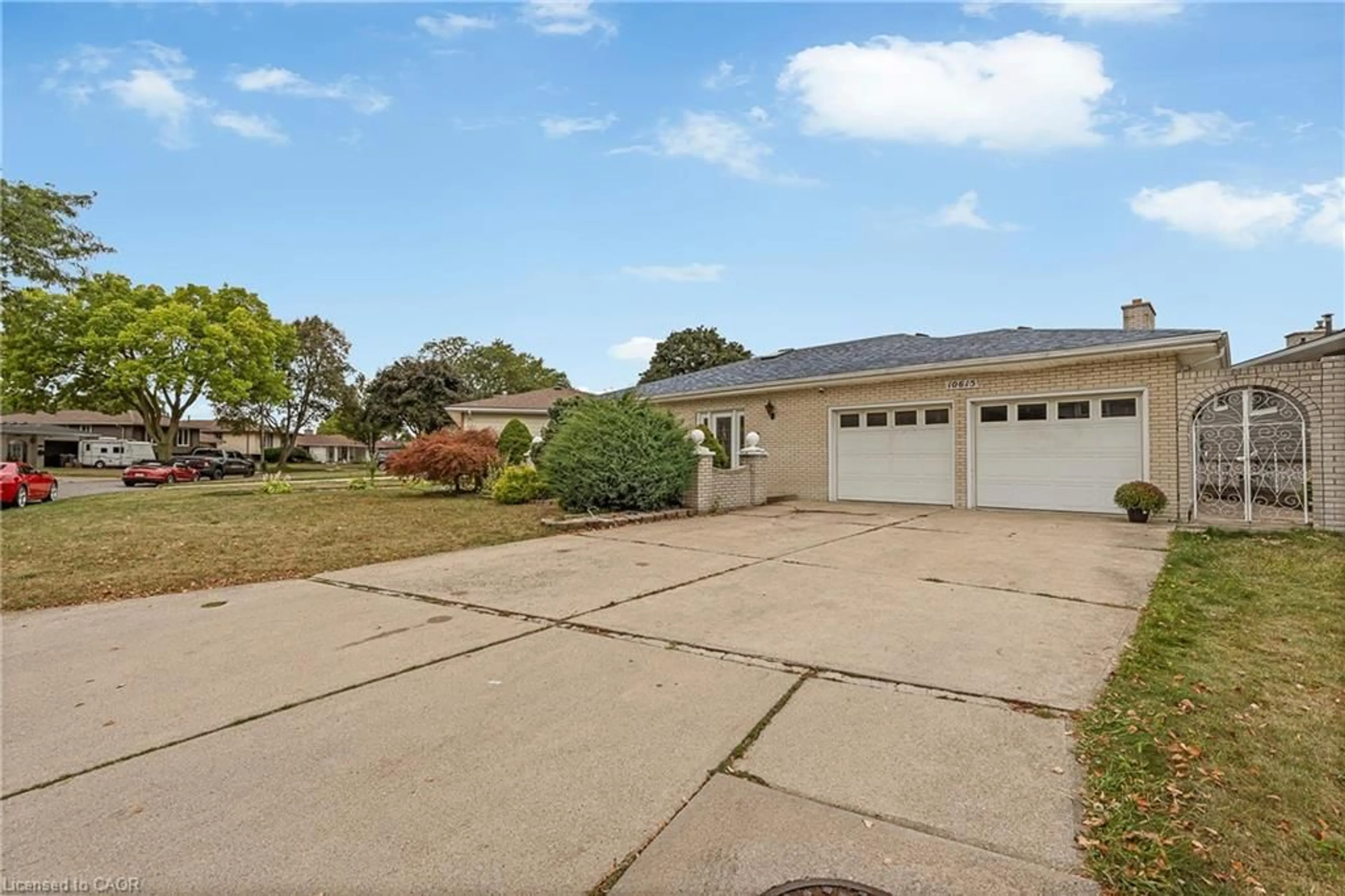 A pic from outside/outdoor area/front of a property/back of a property/a pic from drone, water/lake/river/ocean view for 10615 Keating Cres, Windsor Ontario N8R 1T6